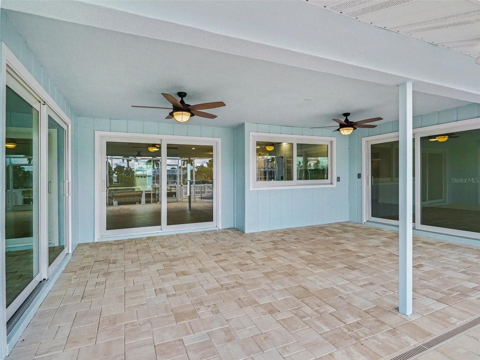 Back lanai area has 20 x 14 feet of extended under roof living space - 548 BELVEDERE CT, PUNTA GORDA