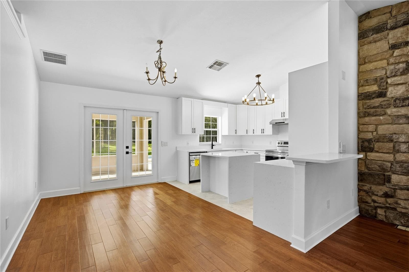 Kitchen Dining + Stone Fireplace - 14810 NW 185 ST, WILLISTON
