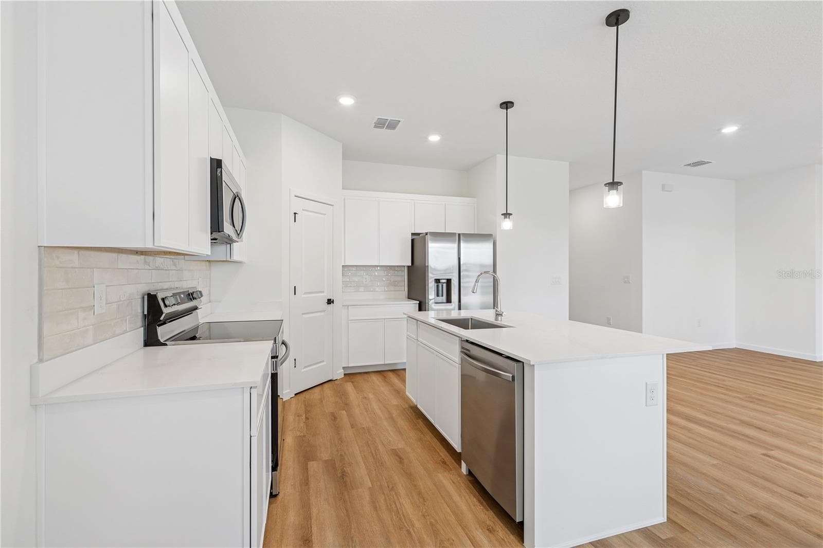 PHOTOS OF SAME MODEL WITH SIMILIAR FINISHES - 86 SPRINGWOOD DR, PALM COAST