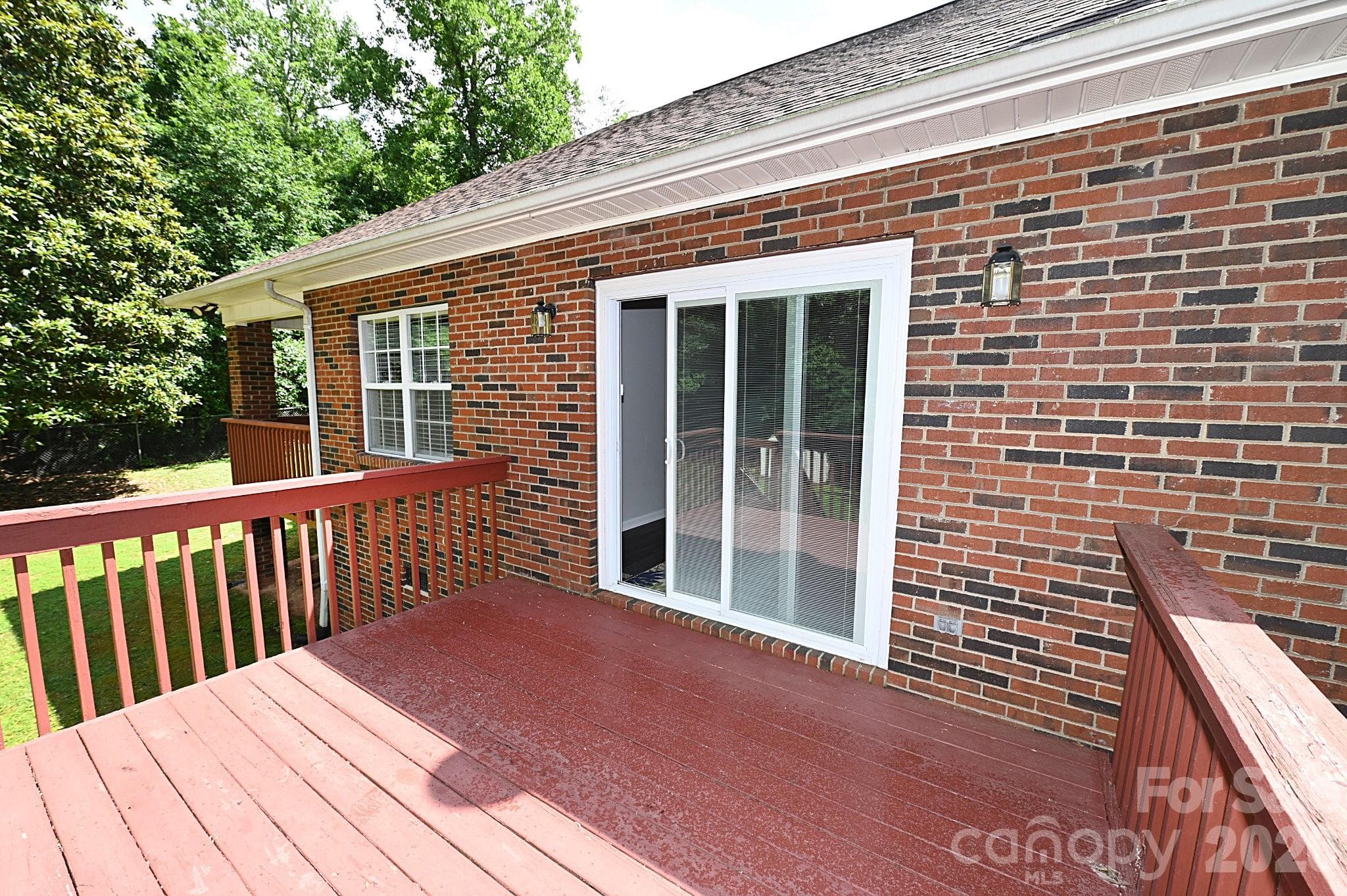 Patio door leads to rear deck - Newton