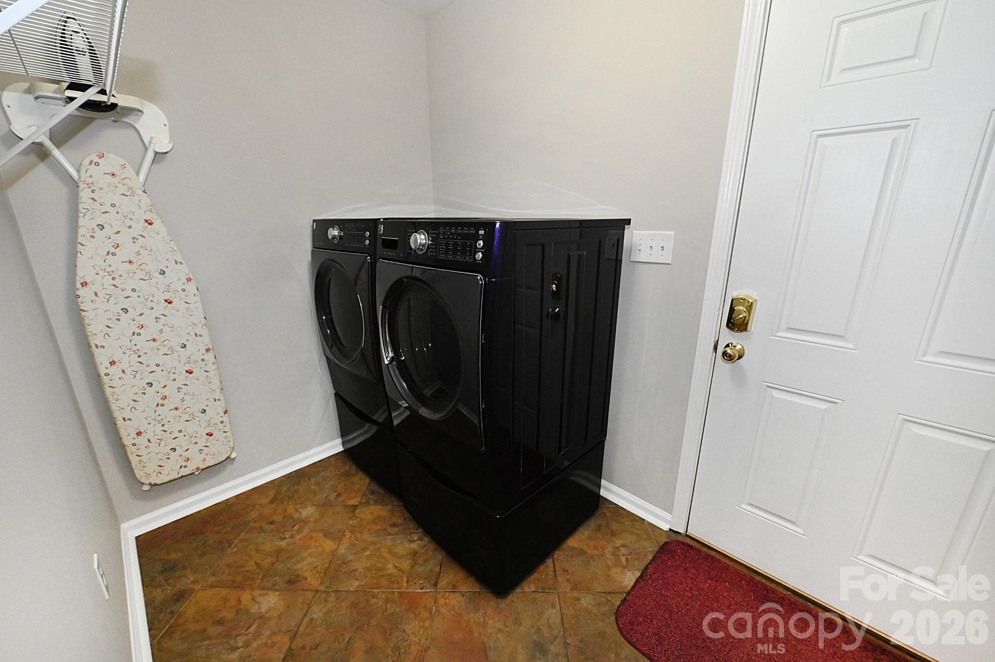 Laundry room with door to the garage - Newton