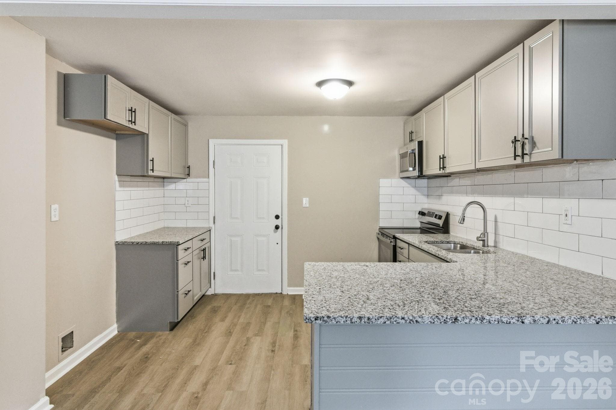 Walking into your updated kitchen. - Charlotte