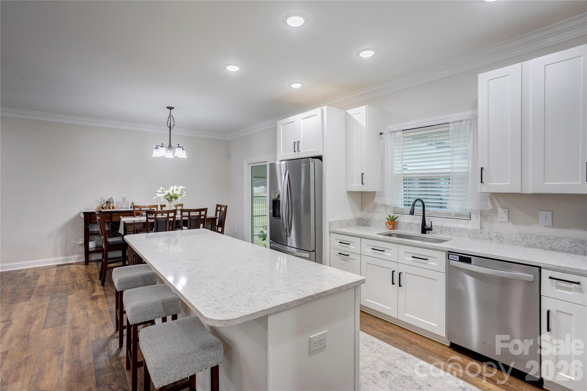 Ready for large gatherings with seating at the island and dining area close by. - 317 Oak Brook Drive, Salisbury