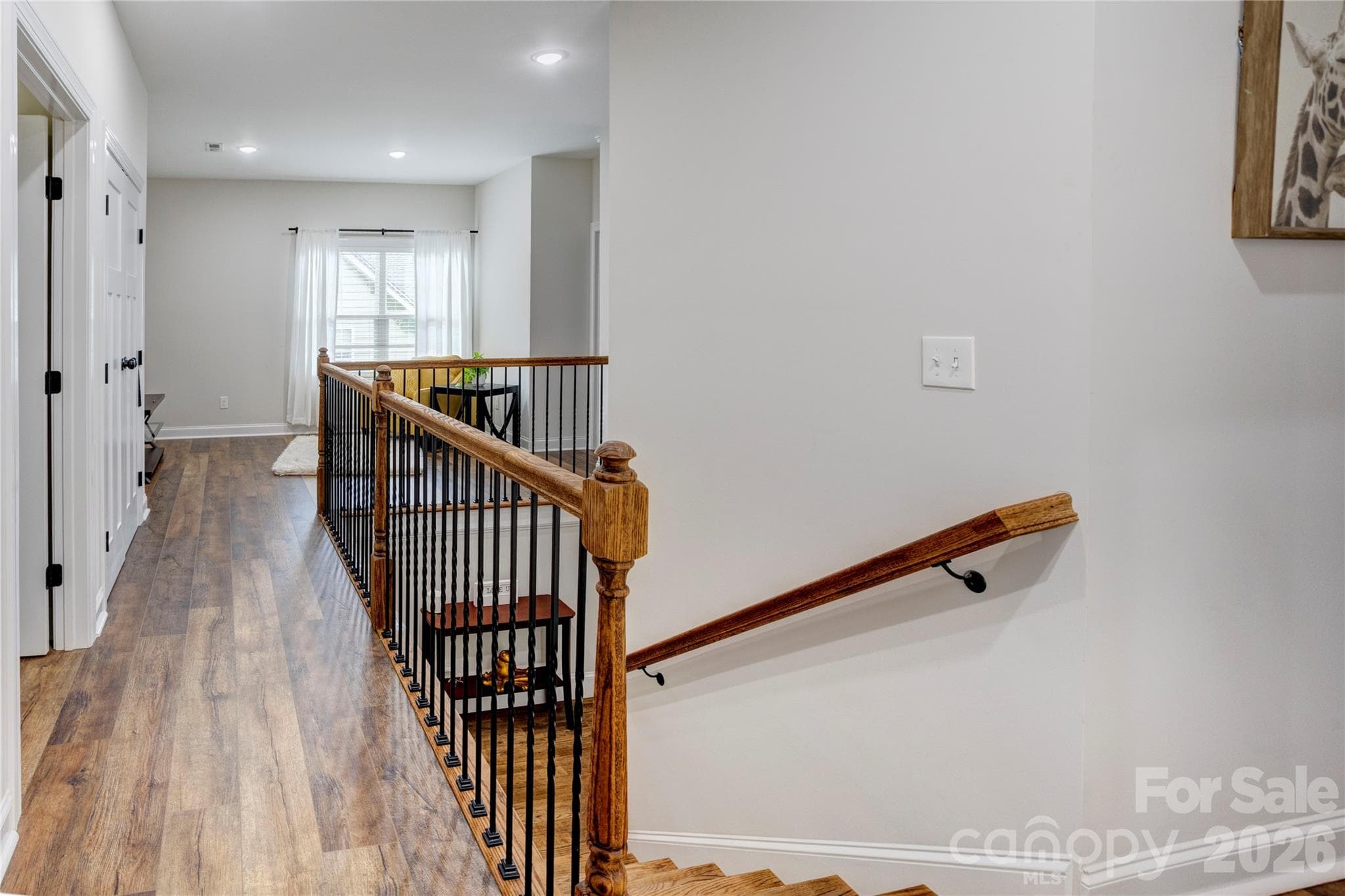 View from the top of the stairs looking towards your loft/flex space. - 317 Oak Brook Drive, Salisbury