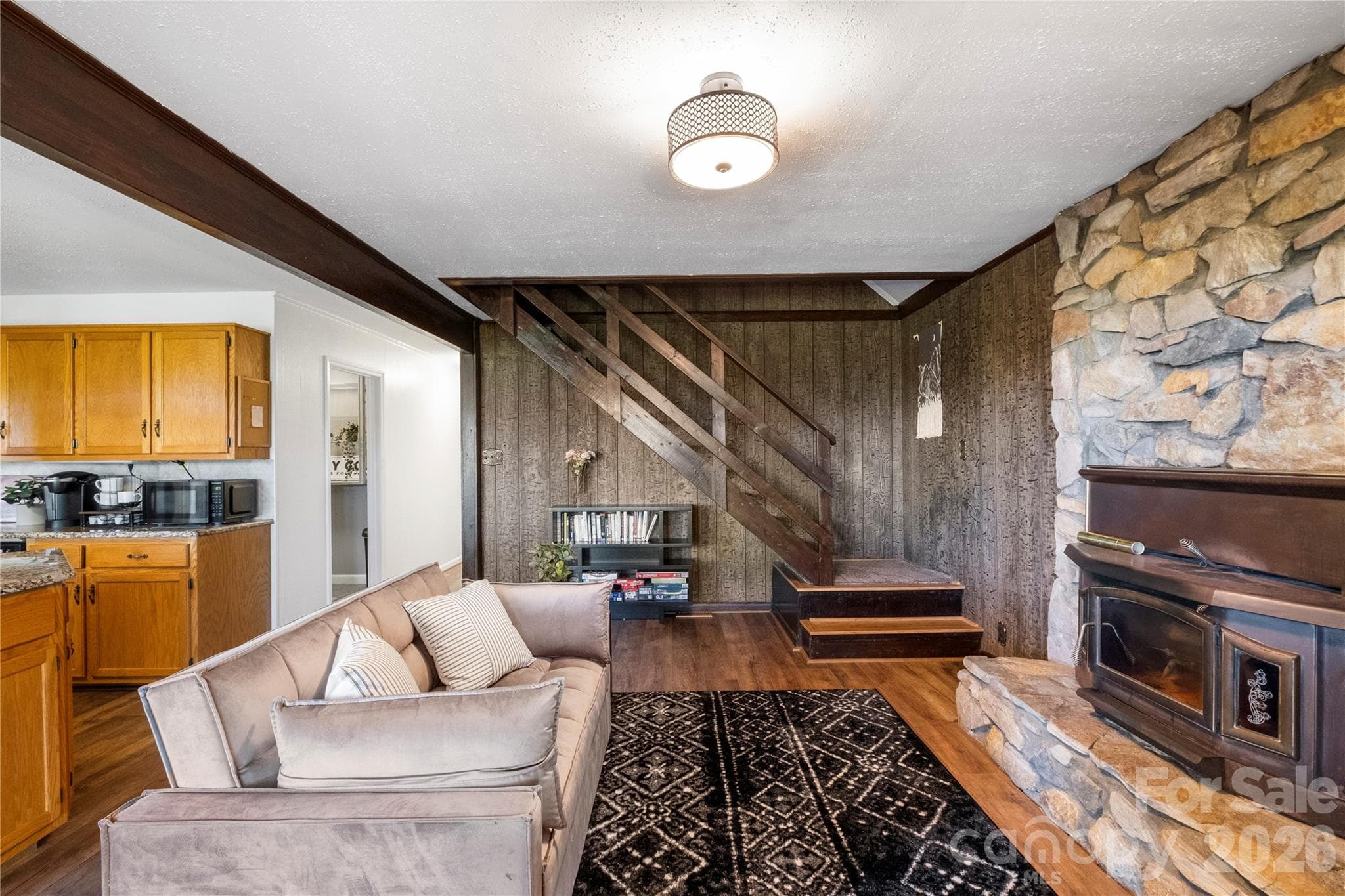 Living Room w/ Wood-Burning Fireplace - 5545 Pine Ridge Drive, Connelly Springs