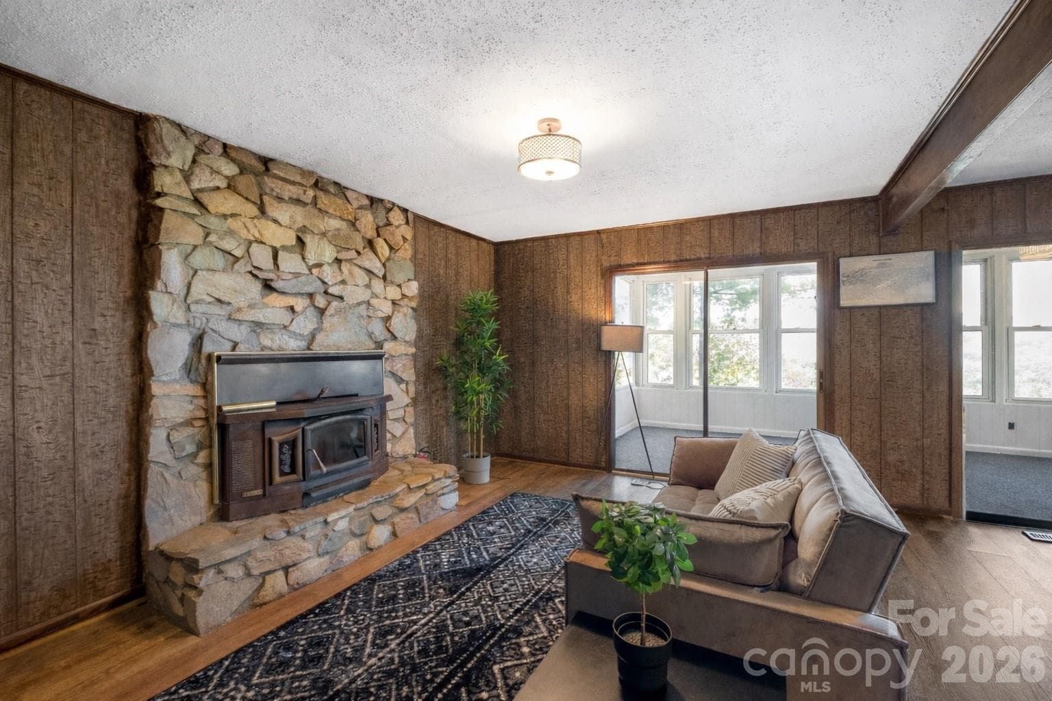 Living Room w/ Wood-Burning Fireplace - 5545 Pine Ridge Drive, Connelly Springs