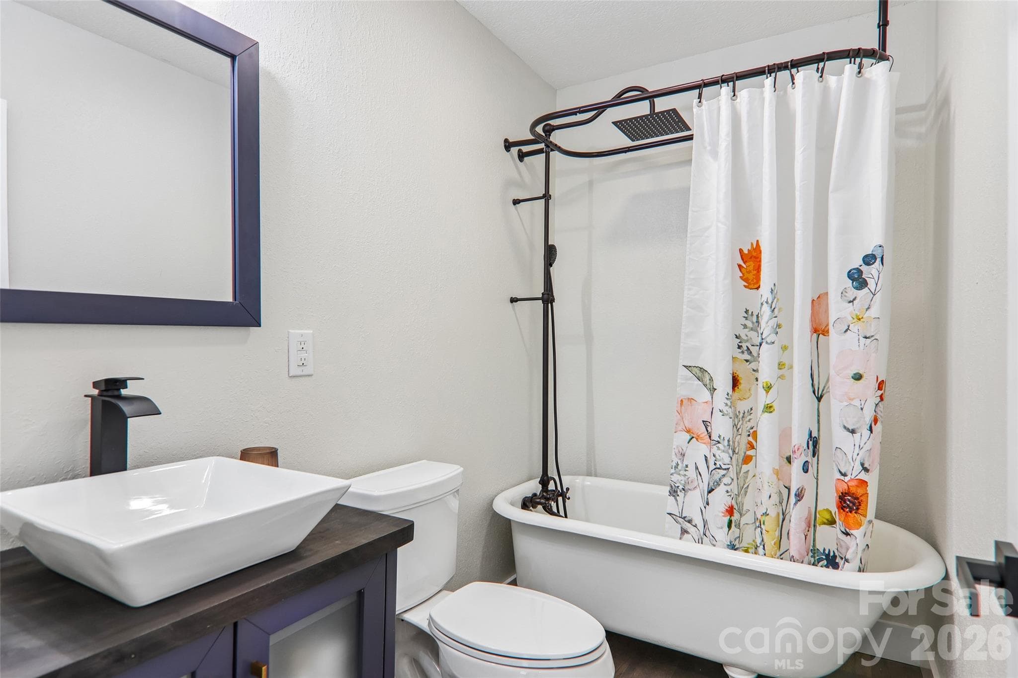 main bathroom with original clawfoot tub/shower - Waynesville