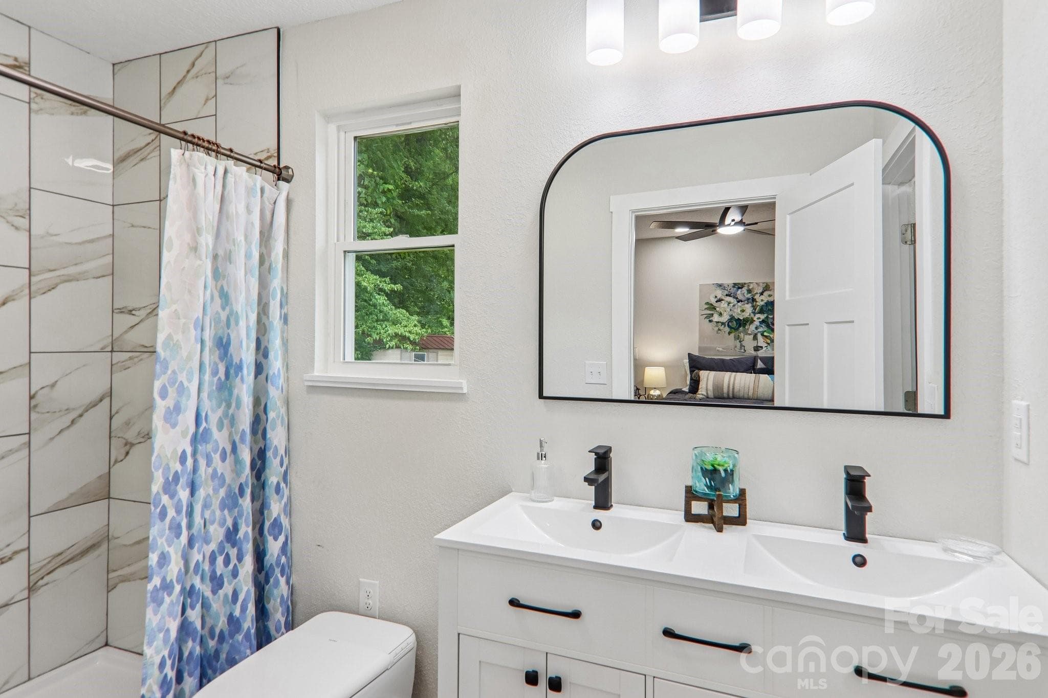 Primary w/ custom tile shower + upgraded toilet w/ bidet - Waynesville