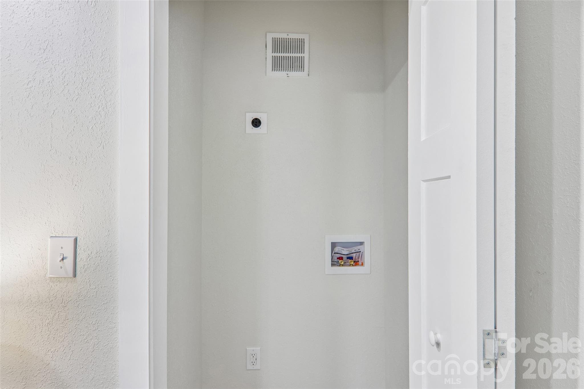 laundry closet in primary - Waynesville