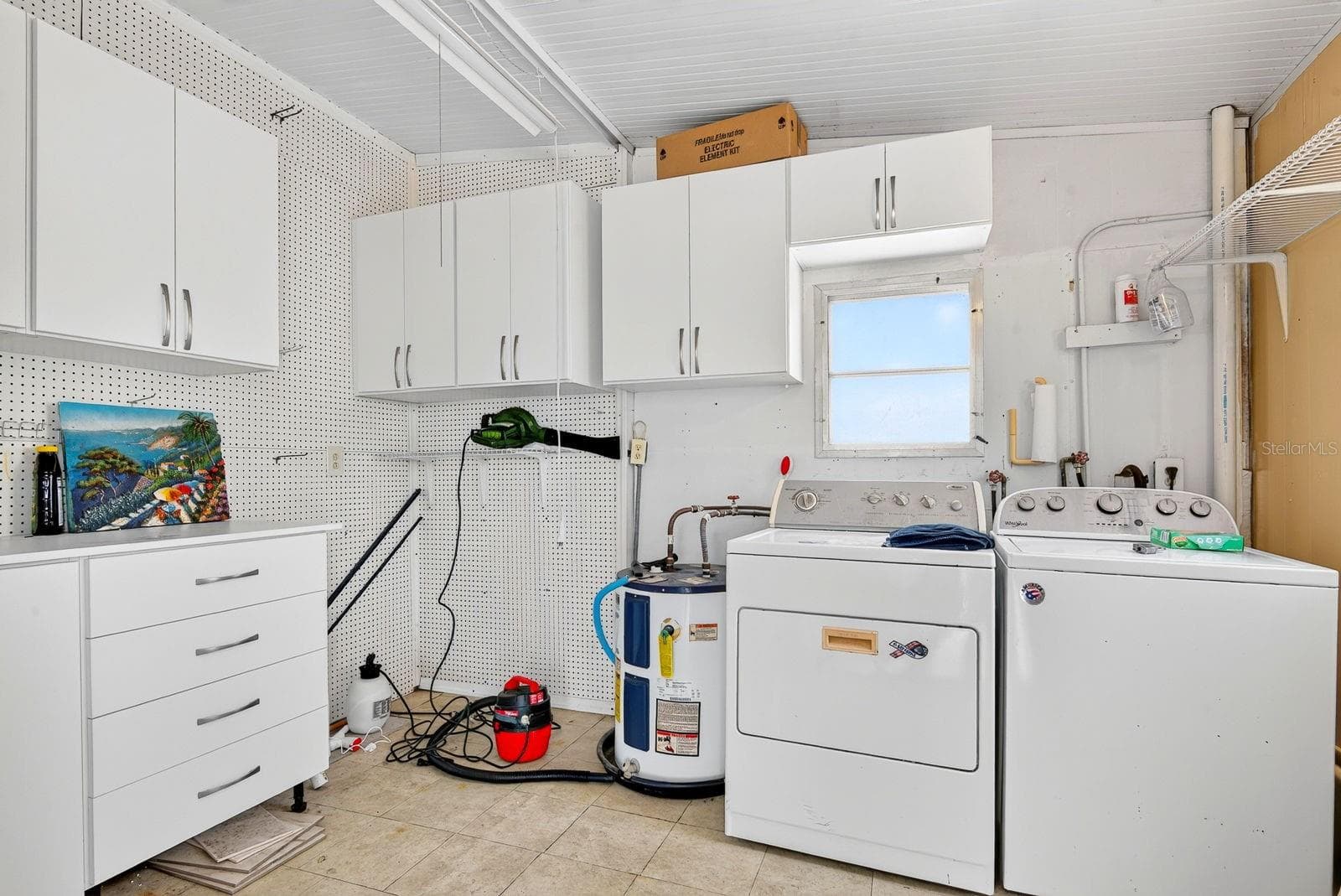 Large outdoor attached undercover laundry and storage area - 2107 PALMA SOLA BLVD #17, BRADENTON