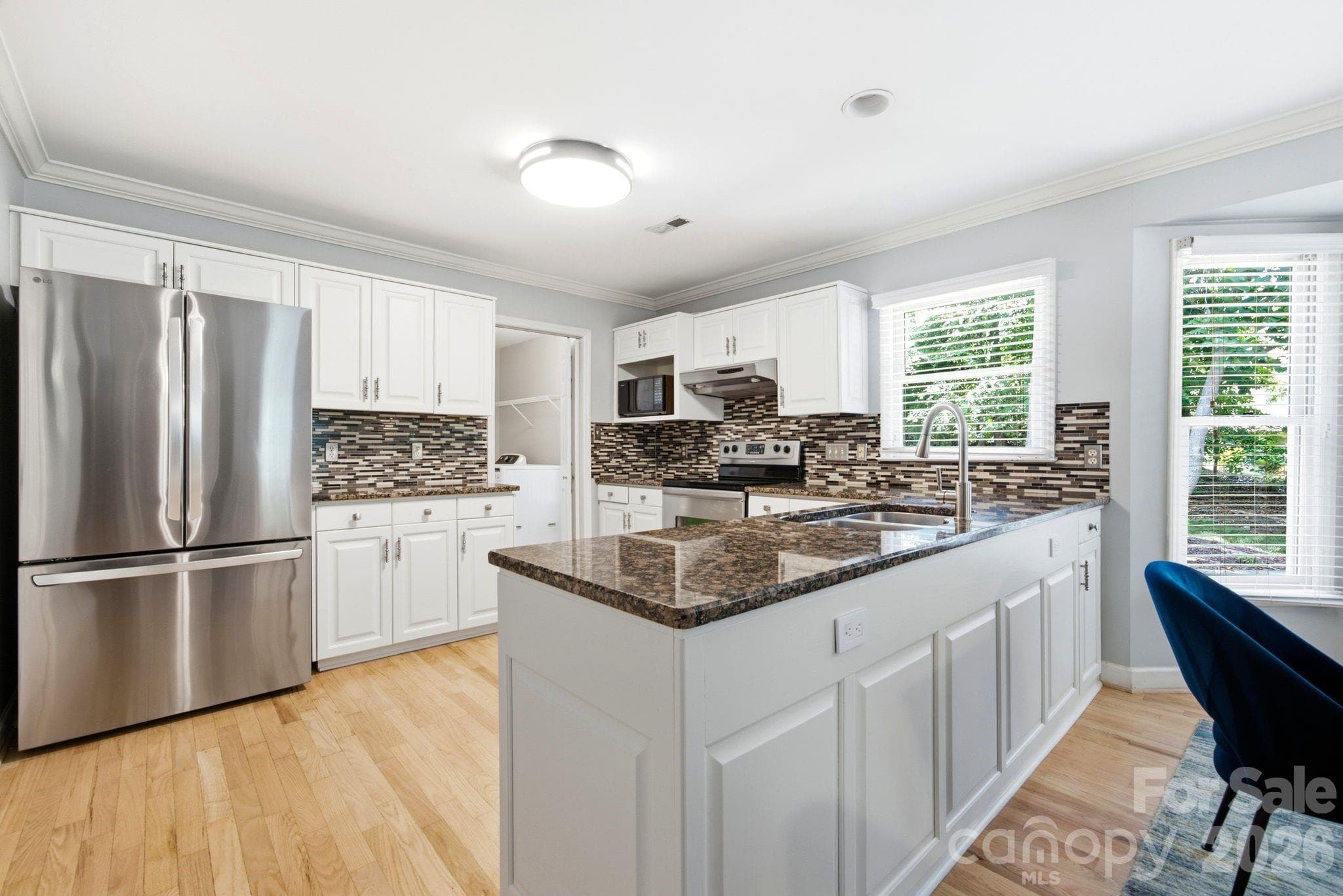 Open kitchen with newer dishwasher and refrigerator - 503 Wyre Forest Court, Charlotte