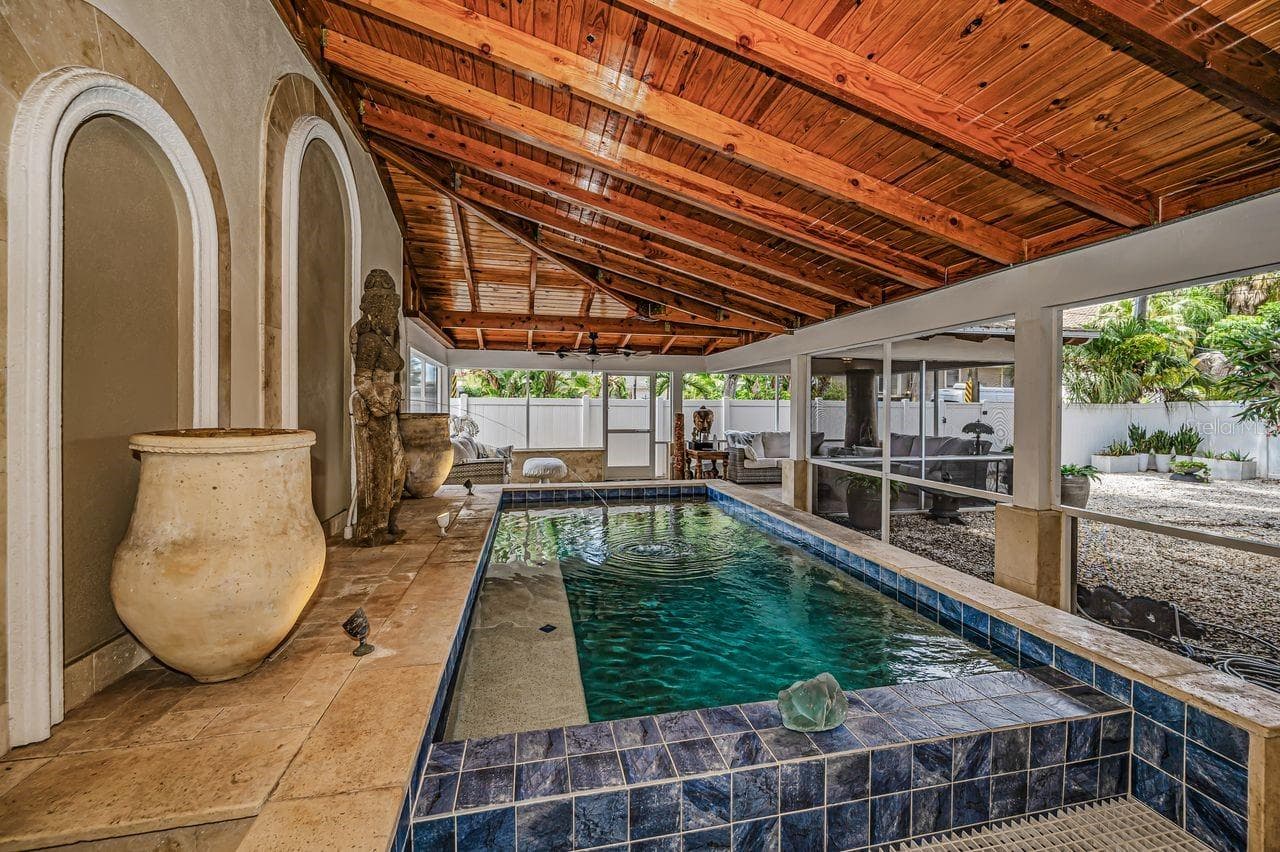 Custom crafted, rafters formed from a solid single Redwood tree, which will stand up effortlessly to Florida’s heavy humidity, salt-air breezes, and year-round heat. - 732 NE OAK ST, ST PETERSBURG