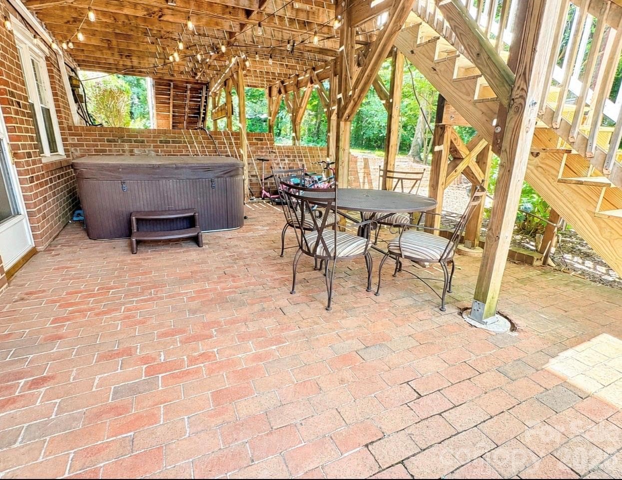Under deck area with brick pavers and hot tub hook ups - 469 Augusta Drive, Statesville