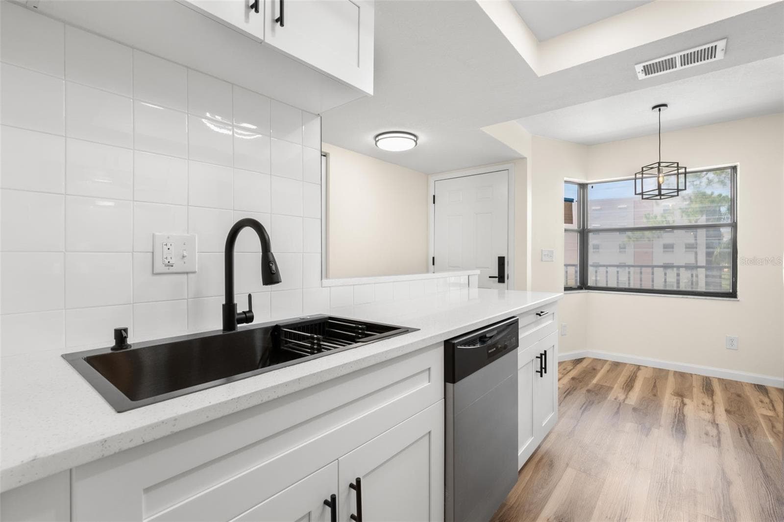 Gorgeous matte black sink and faucet. - 5817 PARK ST N #302, ST PETERSBURG