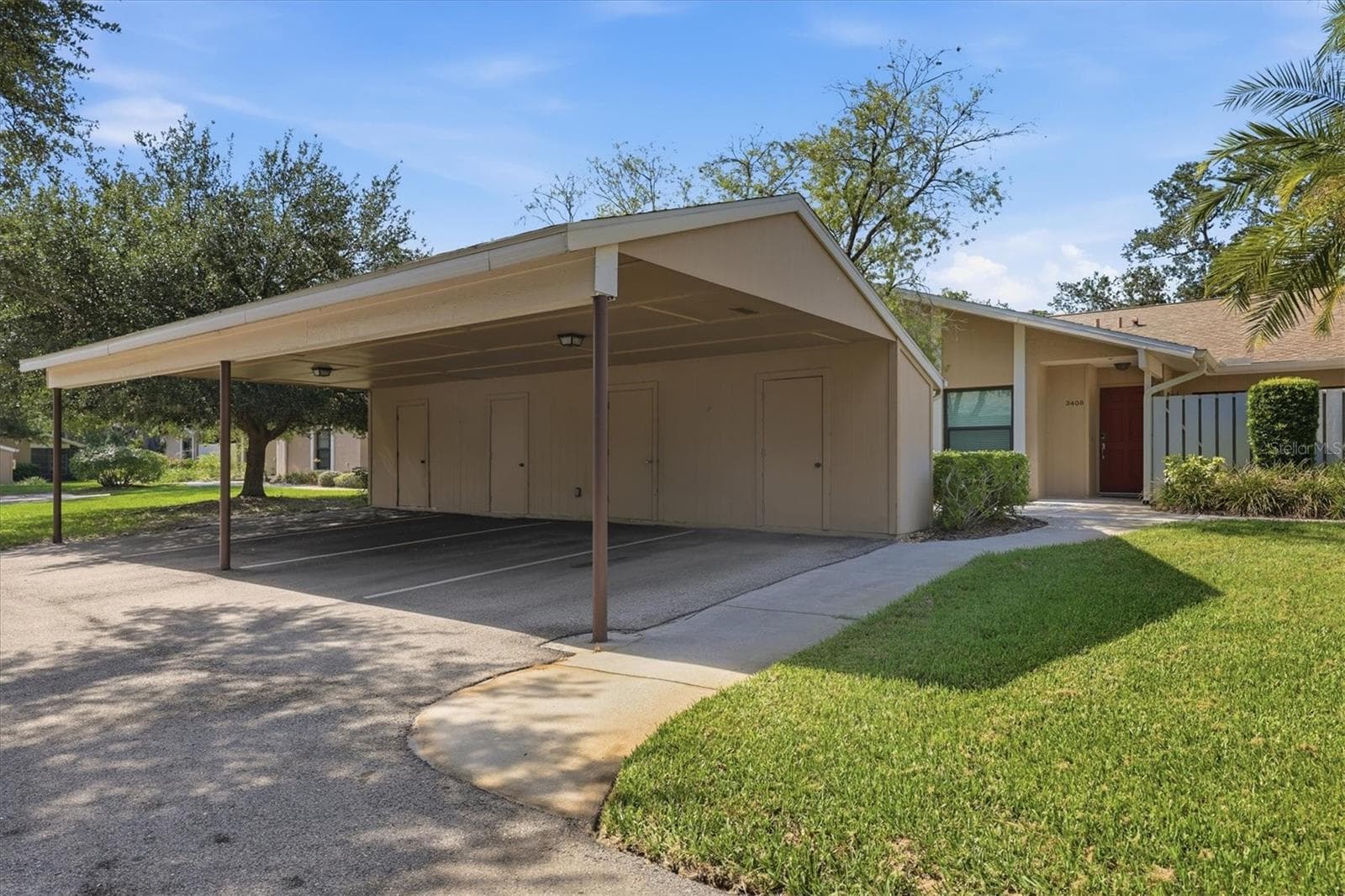 Your 1 car carport & storage with plenty of overflow parking - 3412 TALLYWOOD CIR #7018, SARASOTA