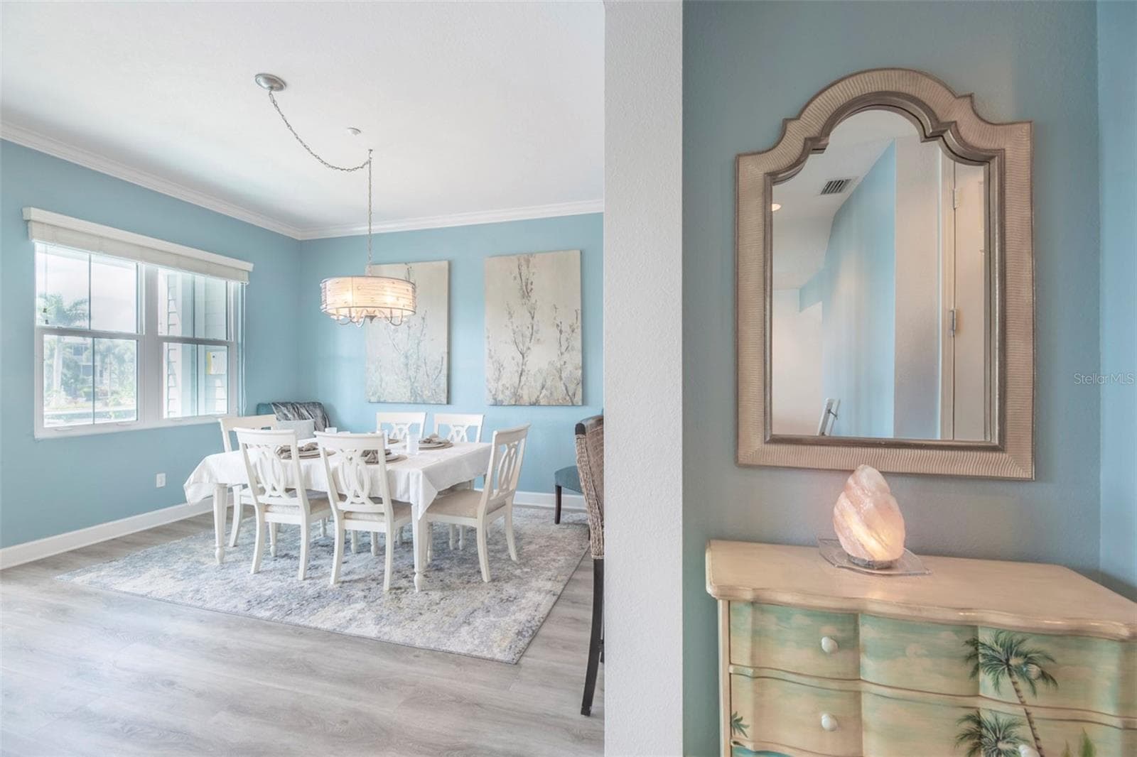 From the kitchen to the living room, additional seating at counter - 10307 CORAL LANDINGS LN #11, PLACIDA