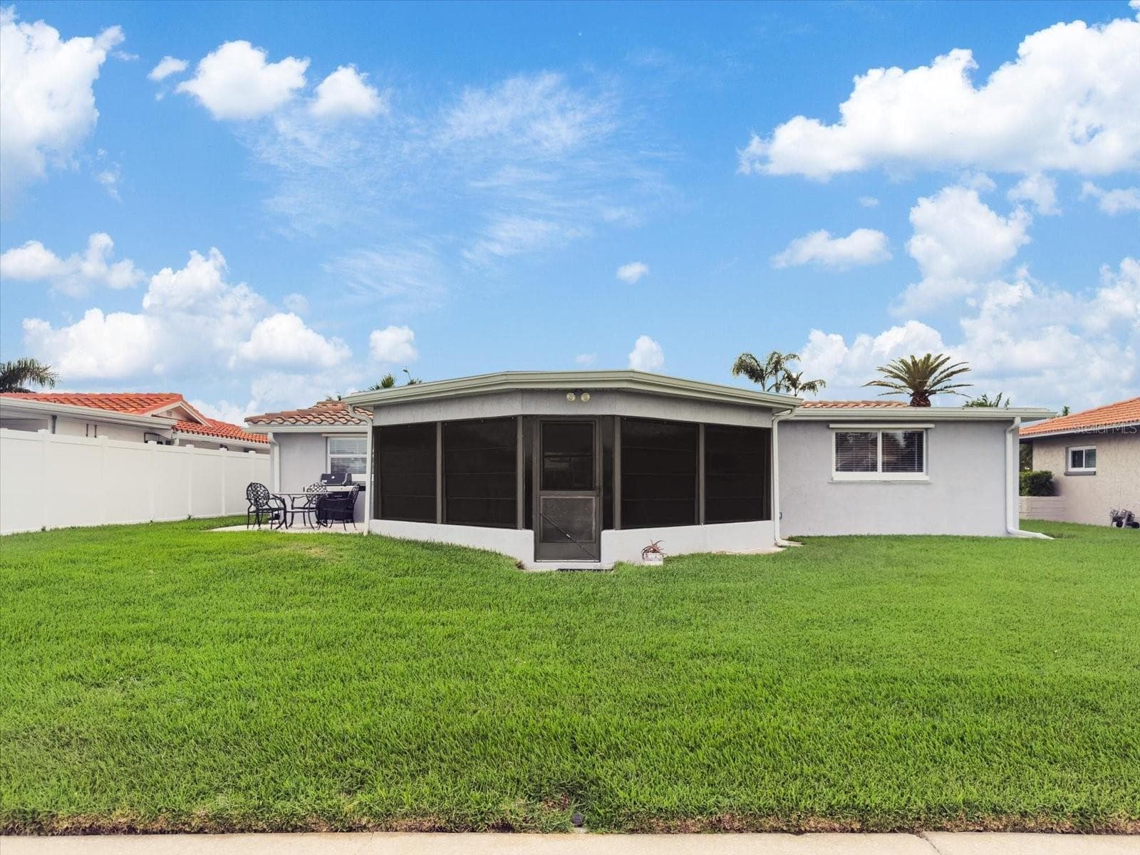 Rear view of home from Seawall - 5008 DORY DR, NEW PORT RICHEY