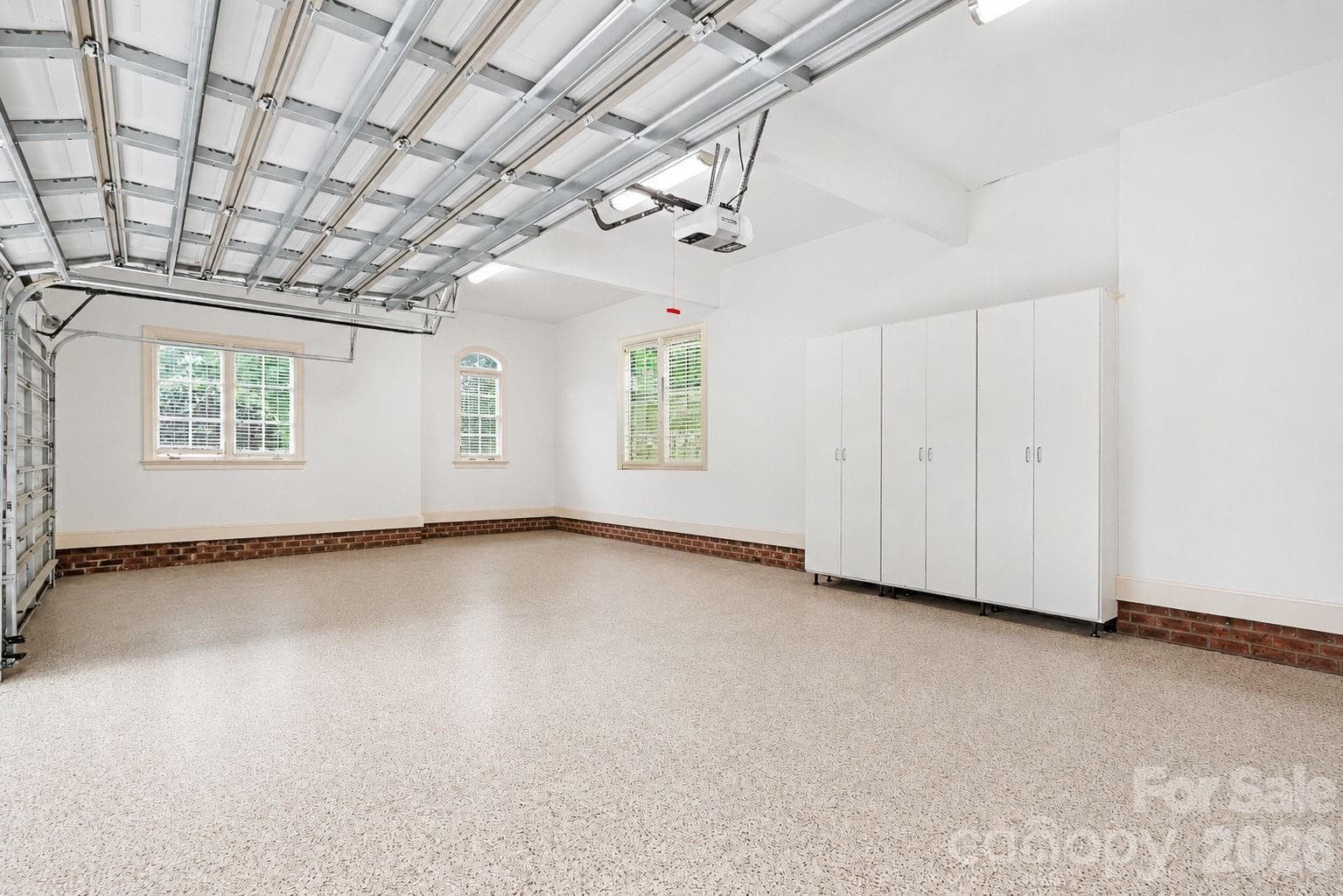 3 car garage w/ epoxy floors and cabinets. - Matthews