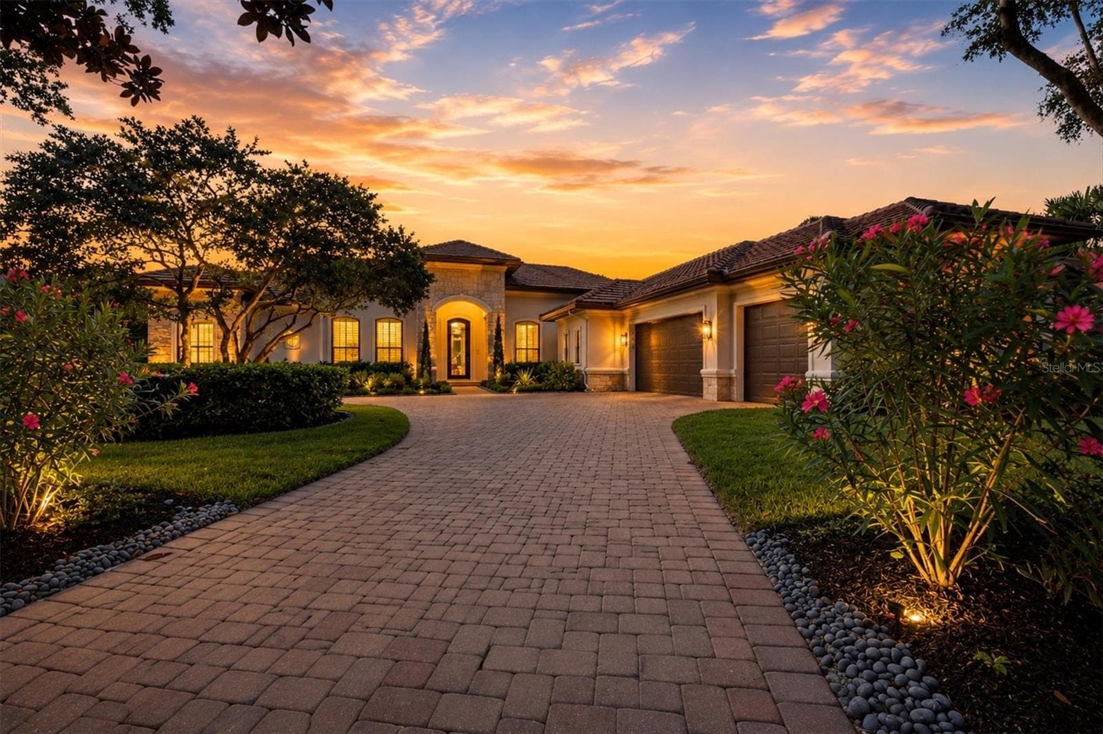 Front View at Twilight - 9261 MCDANIEL LN, SARASOTA