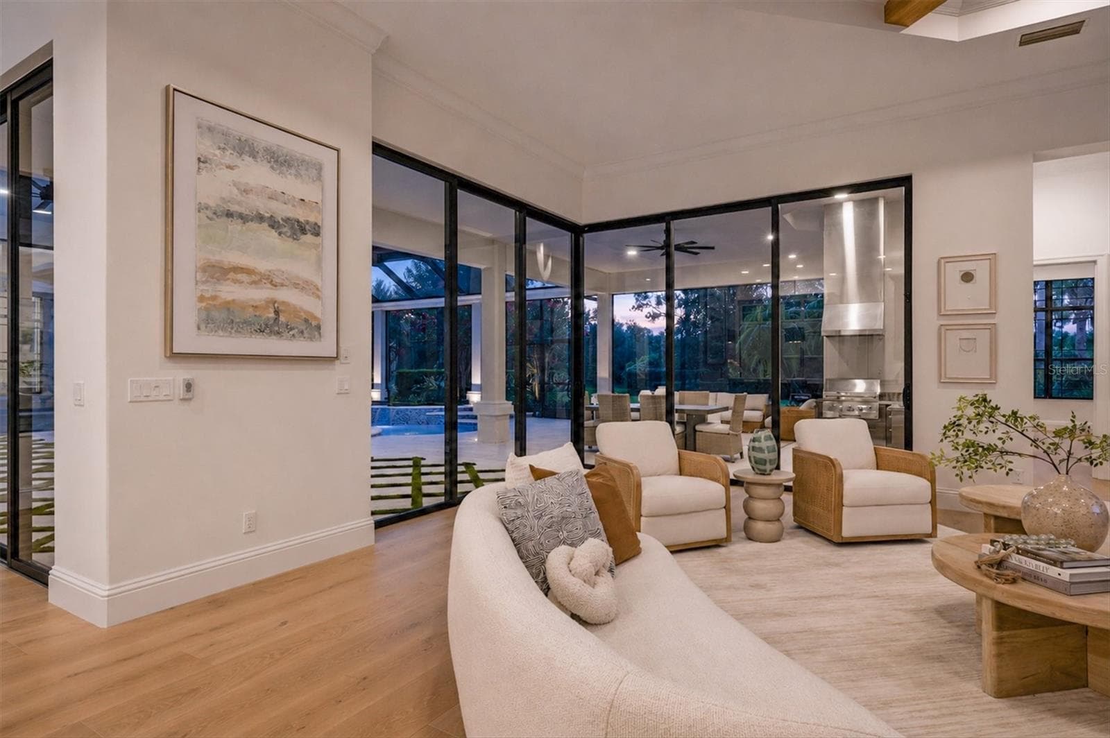 Family Room with view of Pool and Corner Sliders - 9261 MCDANIEL LN, SARASOTA