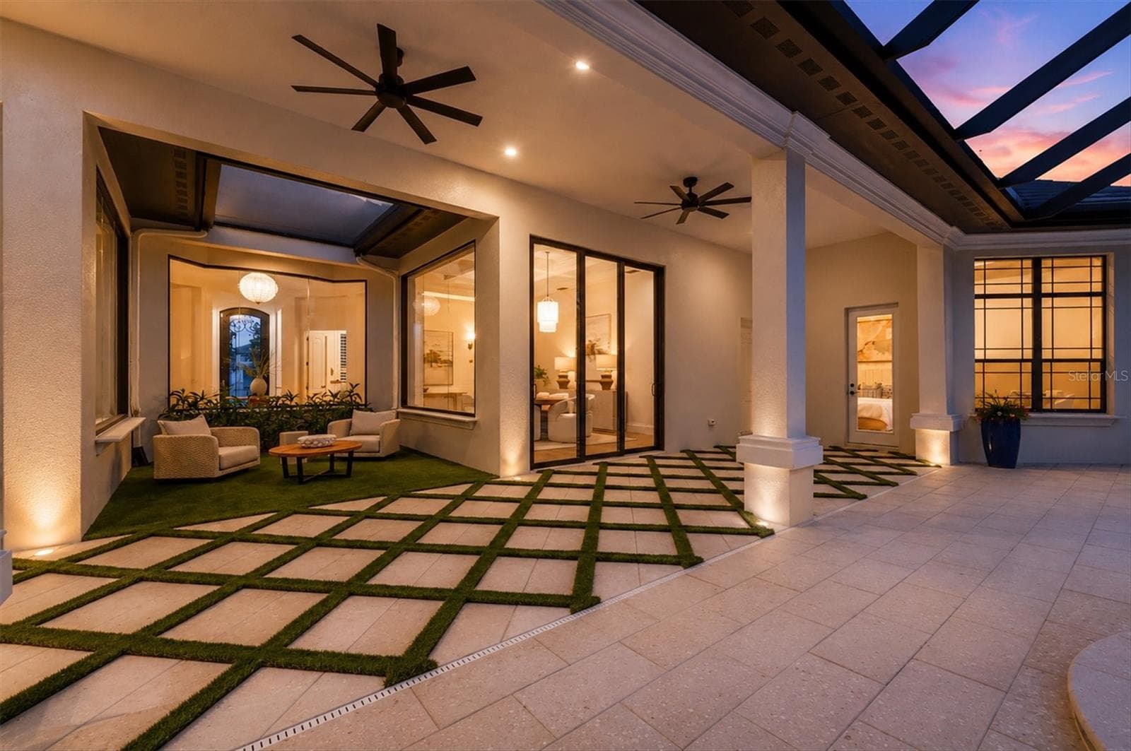 Lanai Sitting Area with Turf - 9261 MCDANIEL LN, SARASOTA