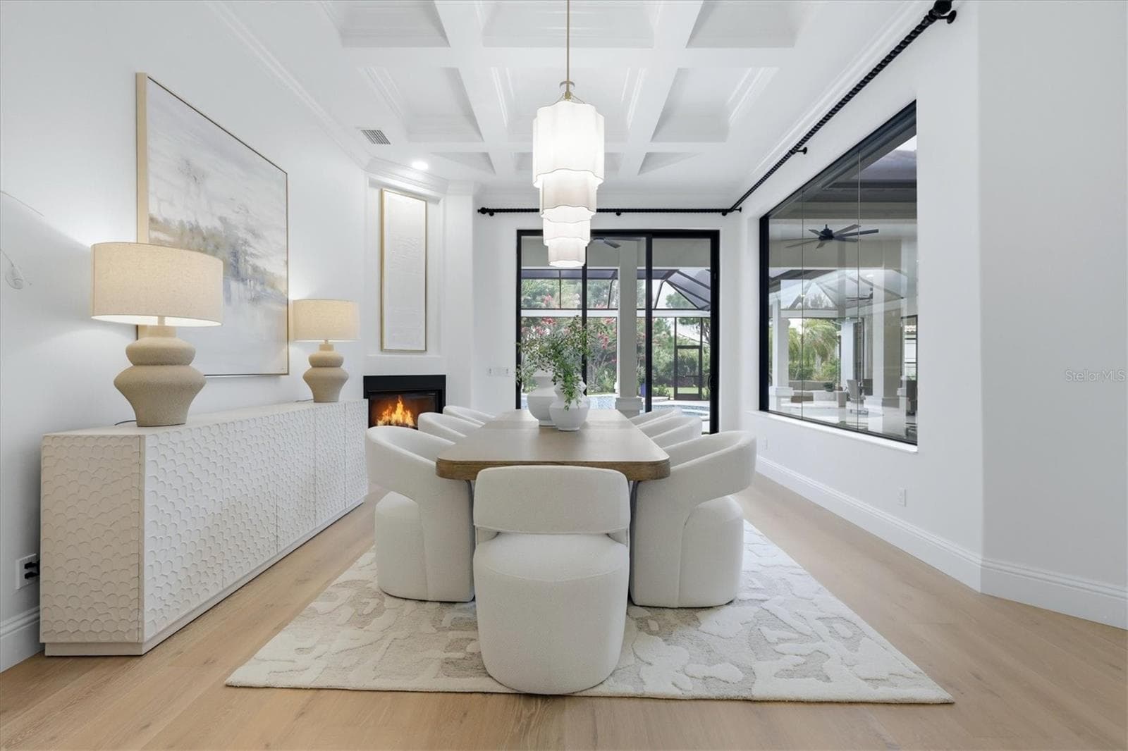 Dining Room, Sliders and Gas Fireplace - 9261 MCDANIEL LN, SARASOTA