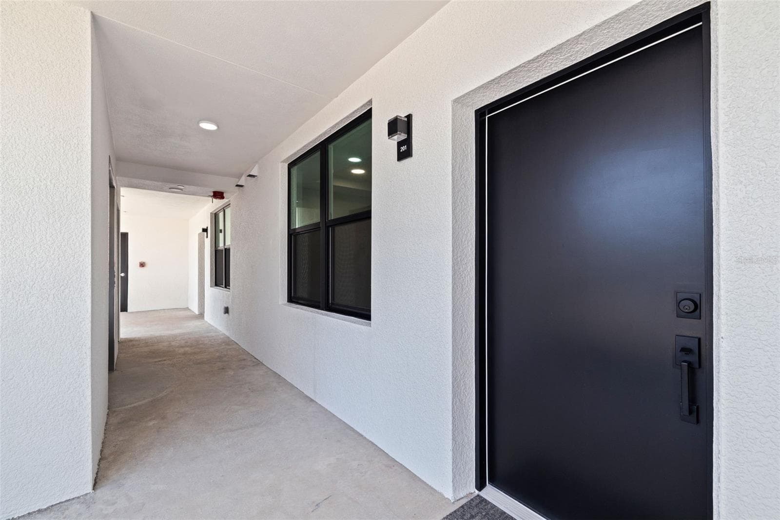 Front door of Unit 201 - 14048 GULF BLVD #201, MADEIRA BEACH