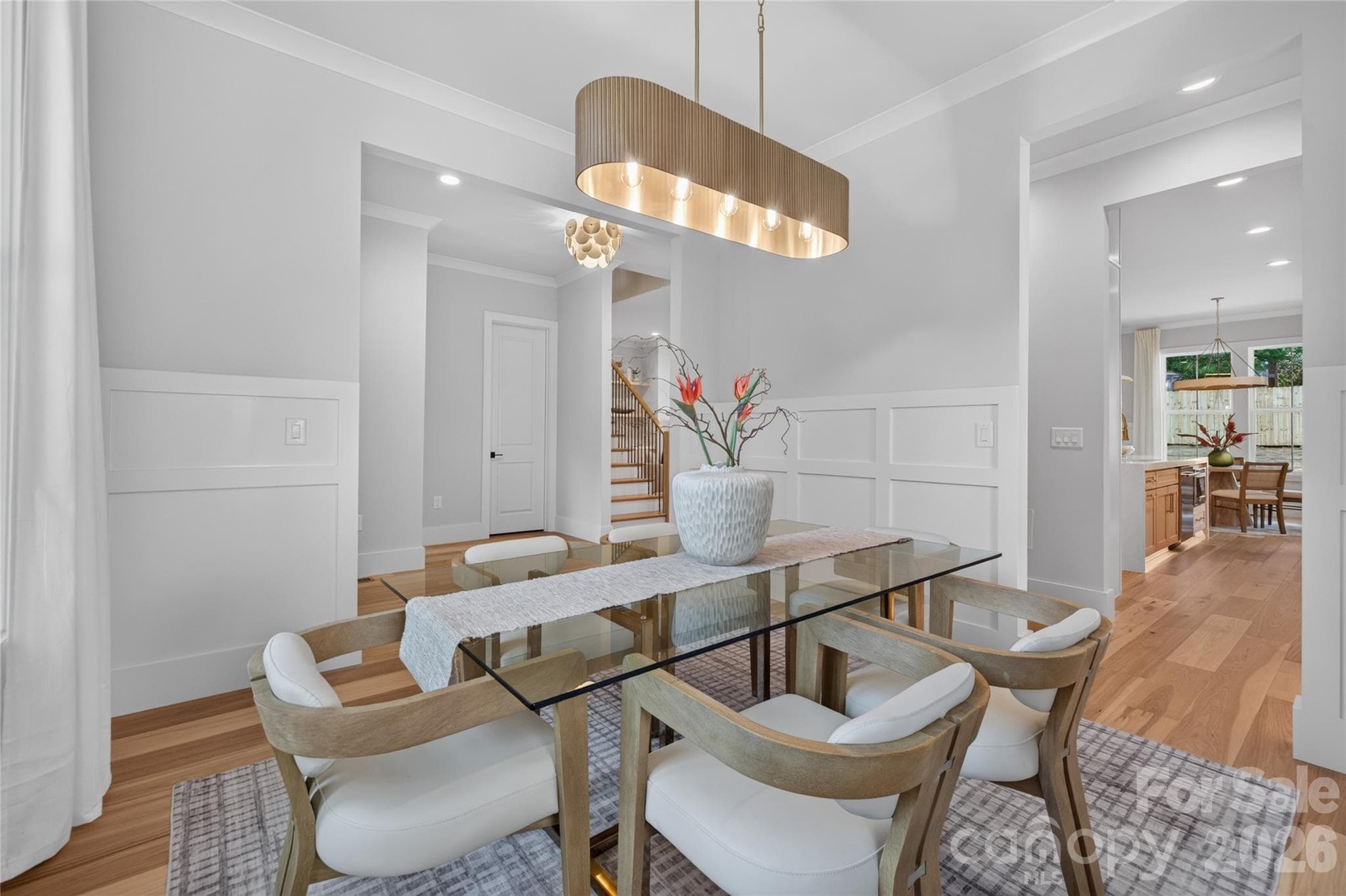 Dining Room: Wainscoting & elegant connection to kitchen via to Butler's Pantry - Charlotte