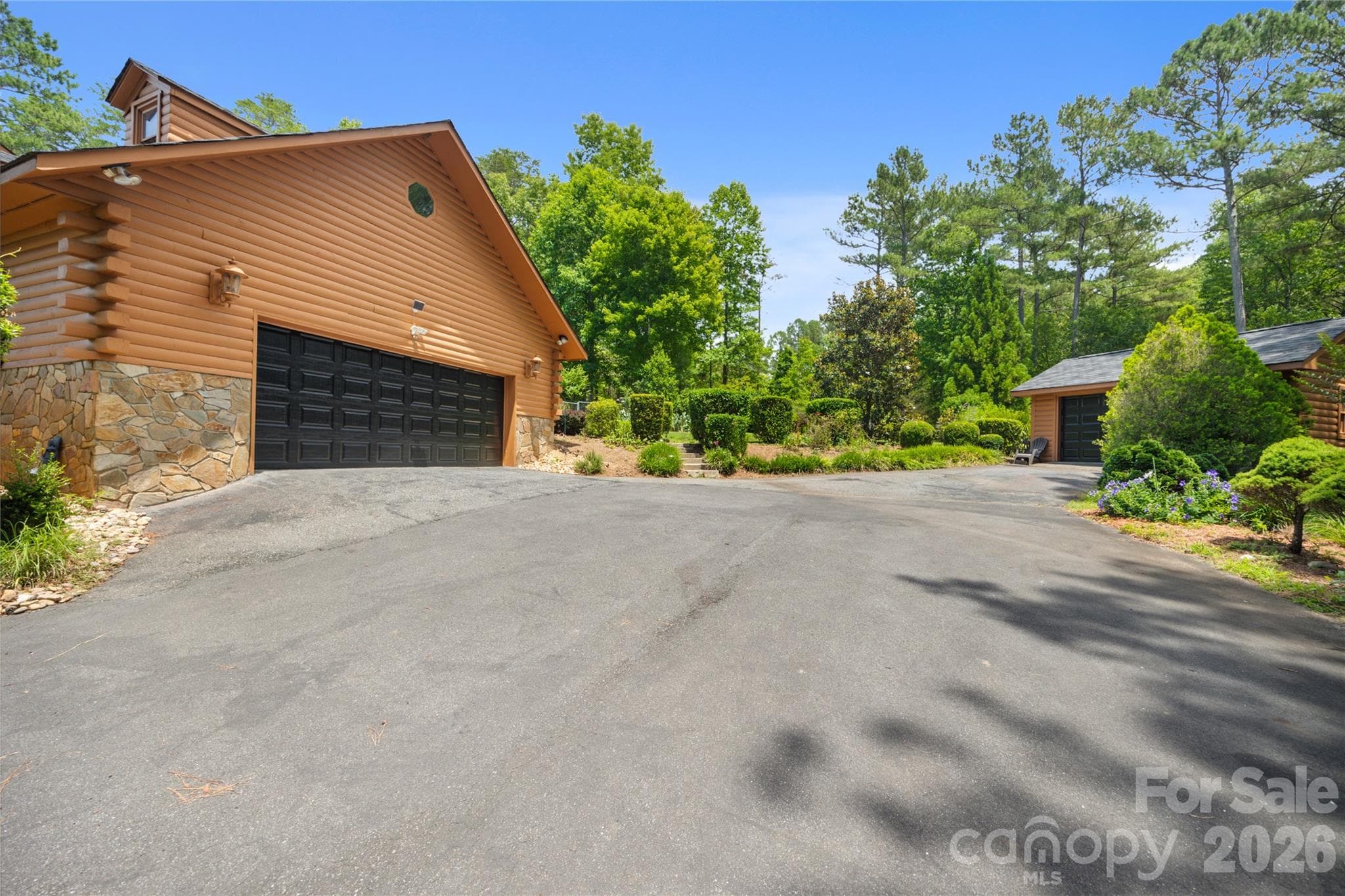 Oversized two car garage, golf cart garage and tons of outdoor parking space available. - 214 Harbor Ridge Drive, Connelly Springs