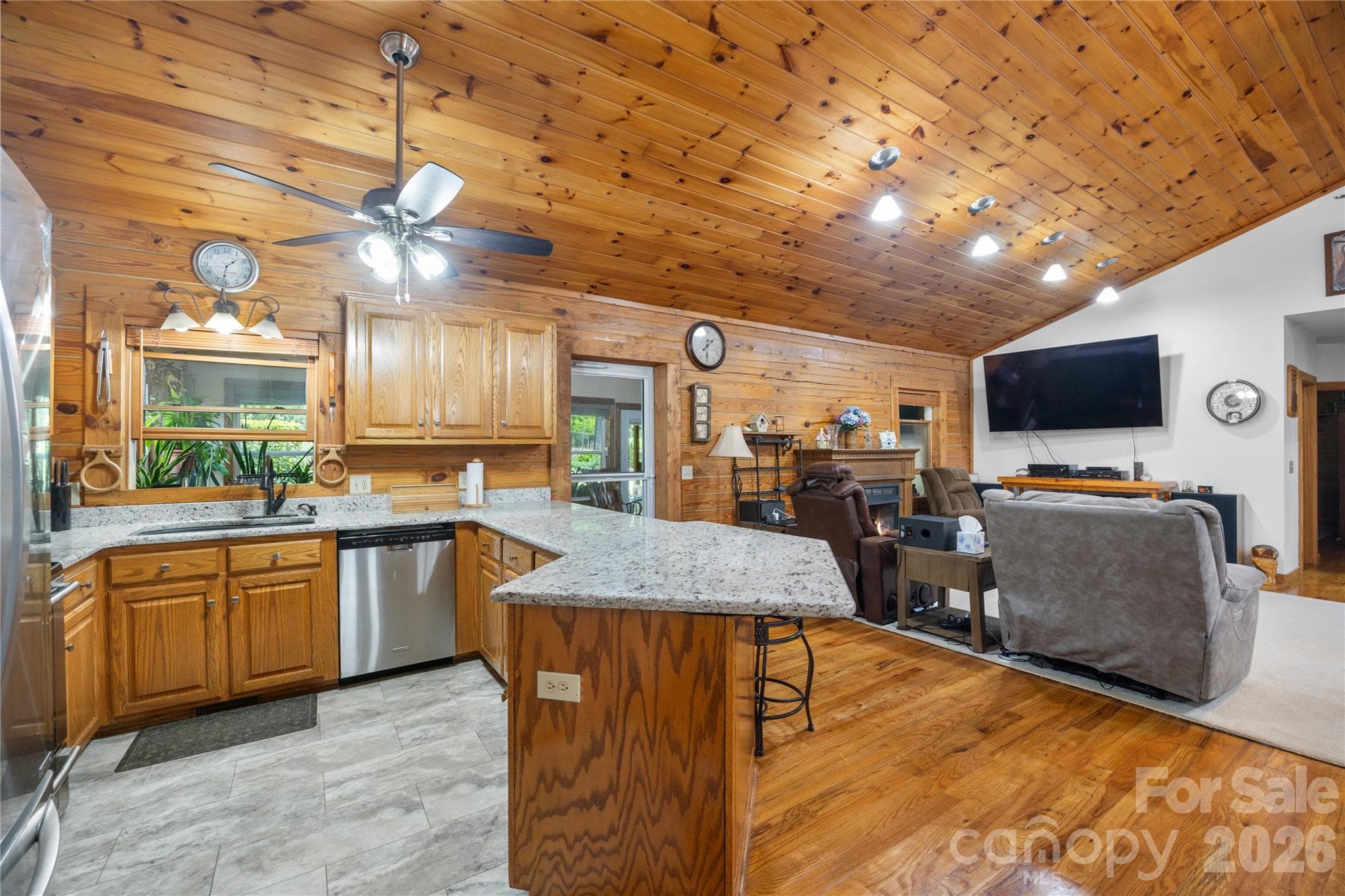 Kitchen seamlessly connects to the main living space. - 214 Harbor Ridge Drive, Connelly Springs