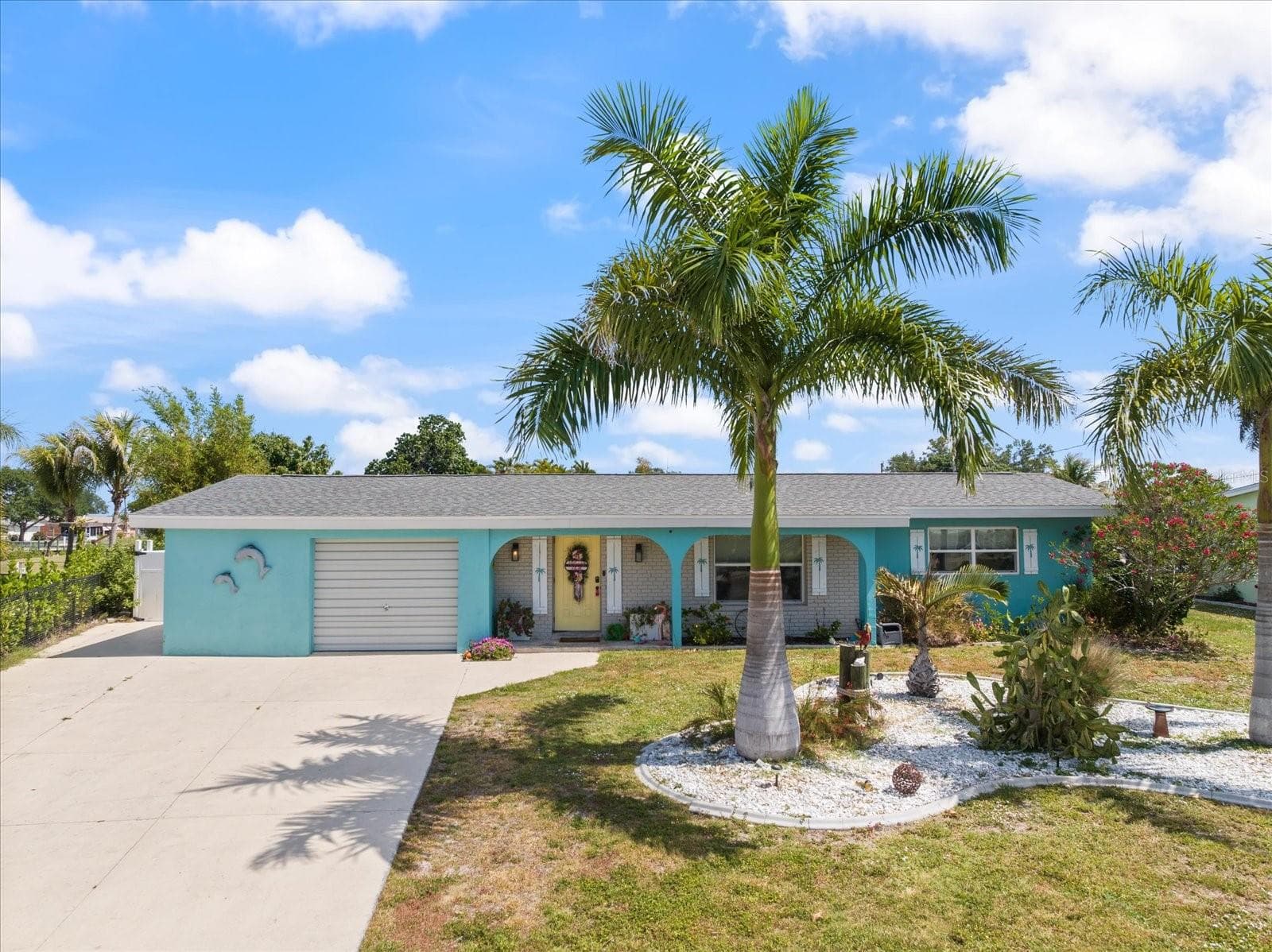 Single Family Residence at 168 BUCKEYE AVE NW, PORT CHARLOTTE, photo 2 of 60