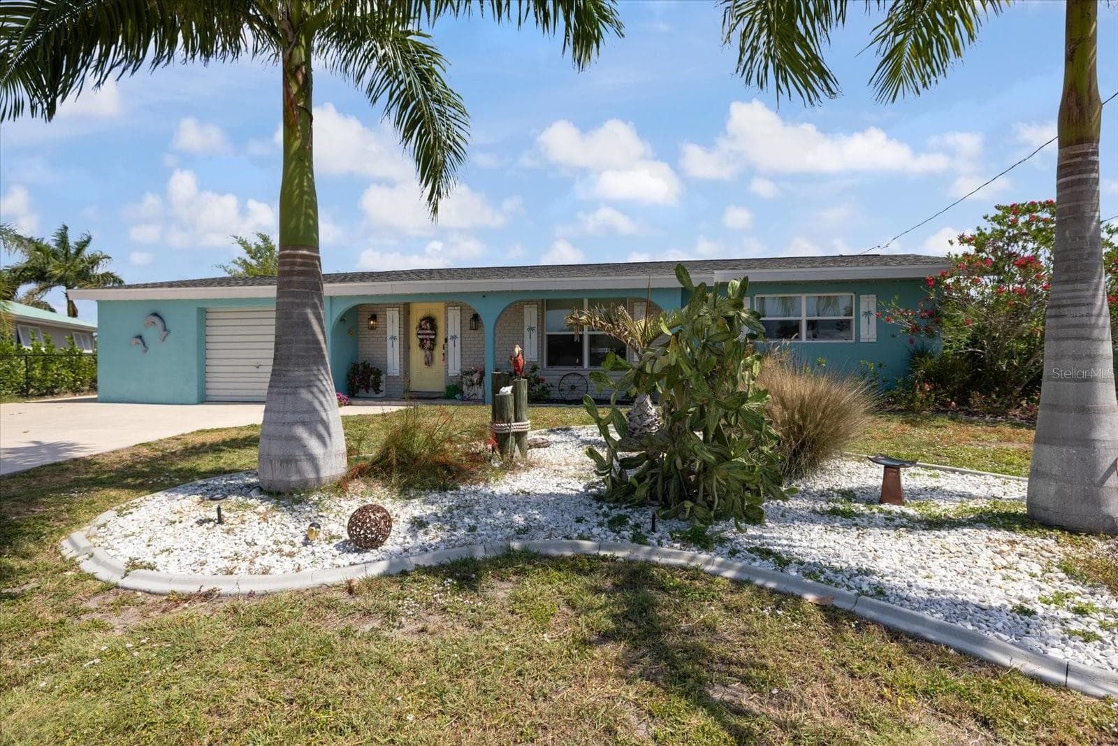 Single Family Residence at 168 BUCKEYE AVE NW, PORT CHARLOTTE, photo 3 of 60