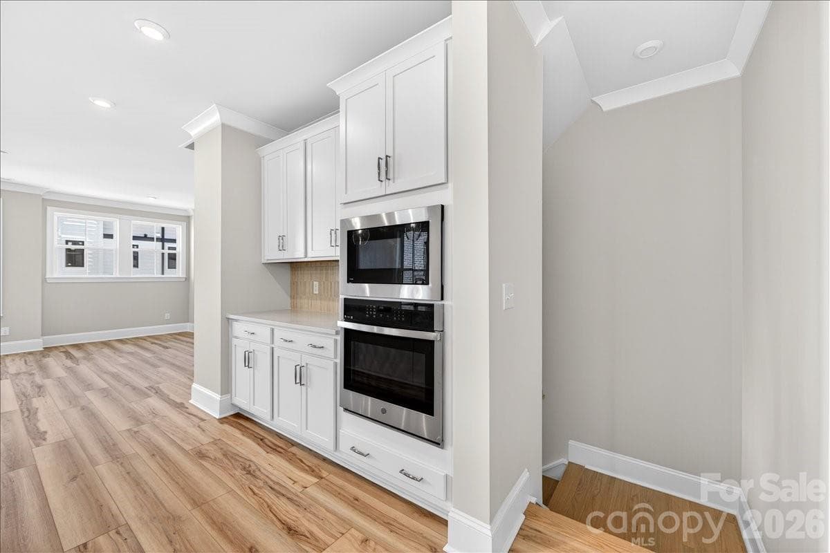 Second floor landing into the gourmet kitchen - 12015 Elsa Lane, Charlotte