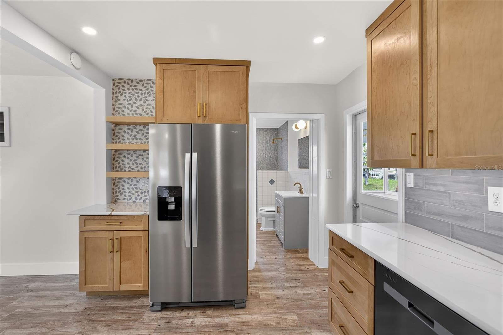 View from kitchen towards bathroom and entry to the Florida room - 10451 MARION ST, ENGLEWOOD