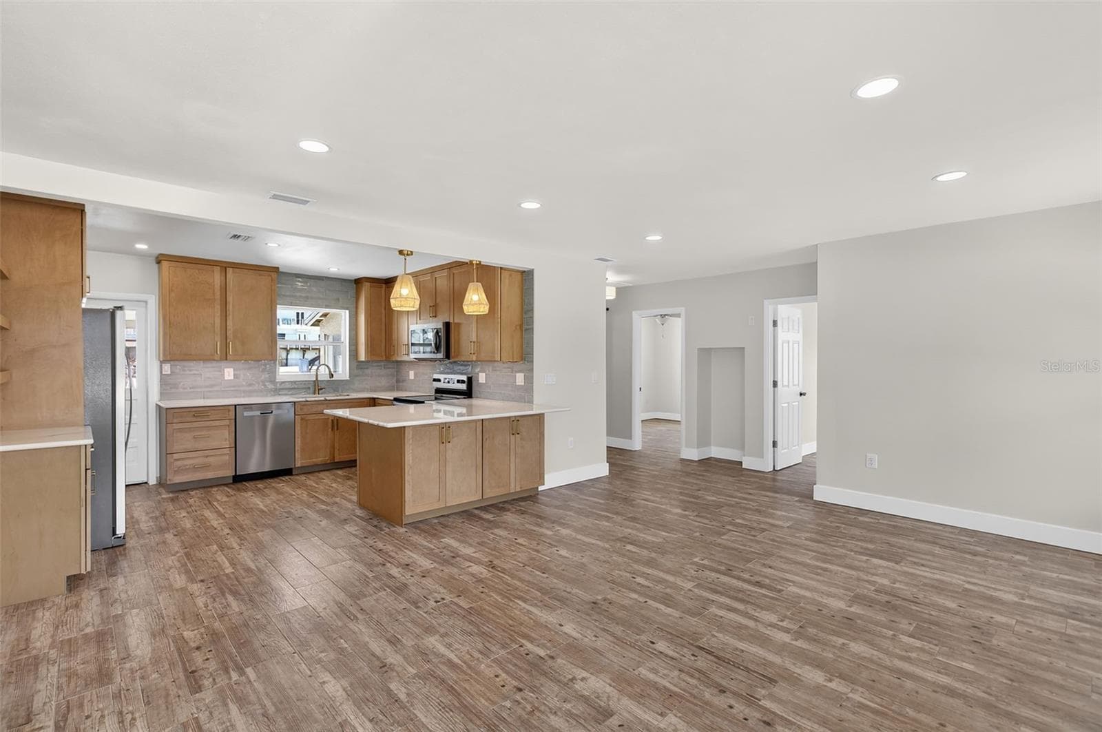 View from living/dining area towards kitchen, bedrooms and bathroom - 10451 MARION ST, ENGLEWOOD