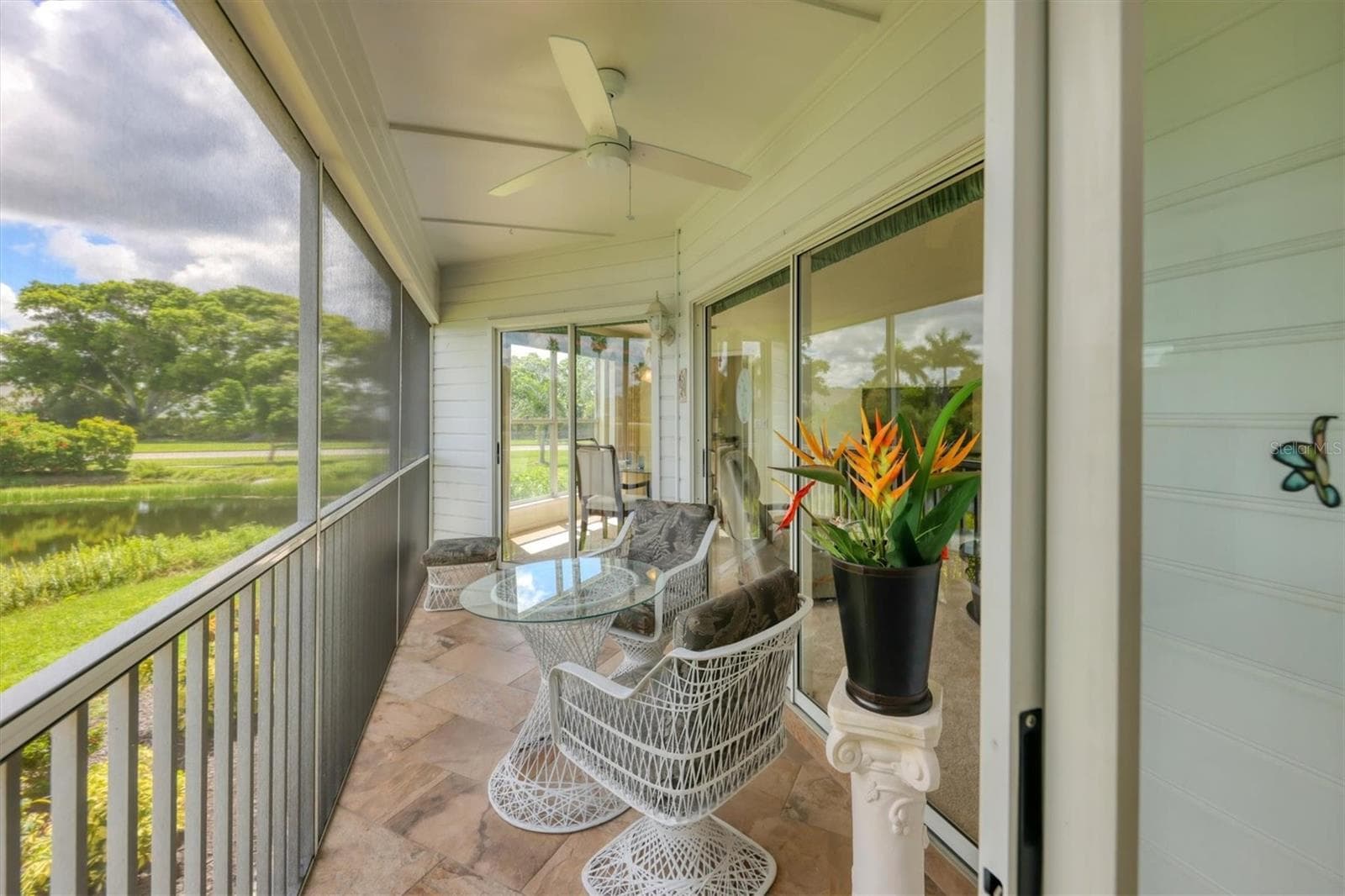Screened lanai overloking pond - 879 AUDUBON DR #879, BRADENTON