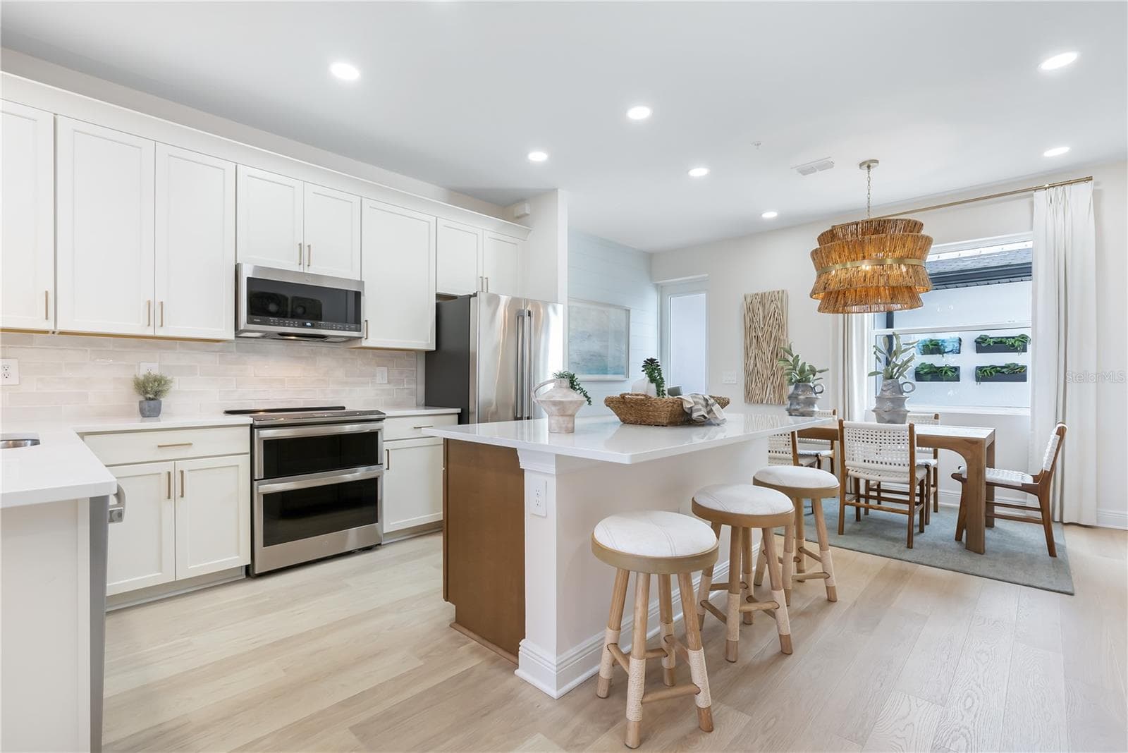 Kitchen:Photo description represents the model home of same floor plan. - 17812 BROADLEAF LOOP, VENICE