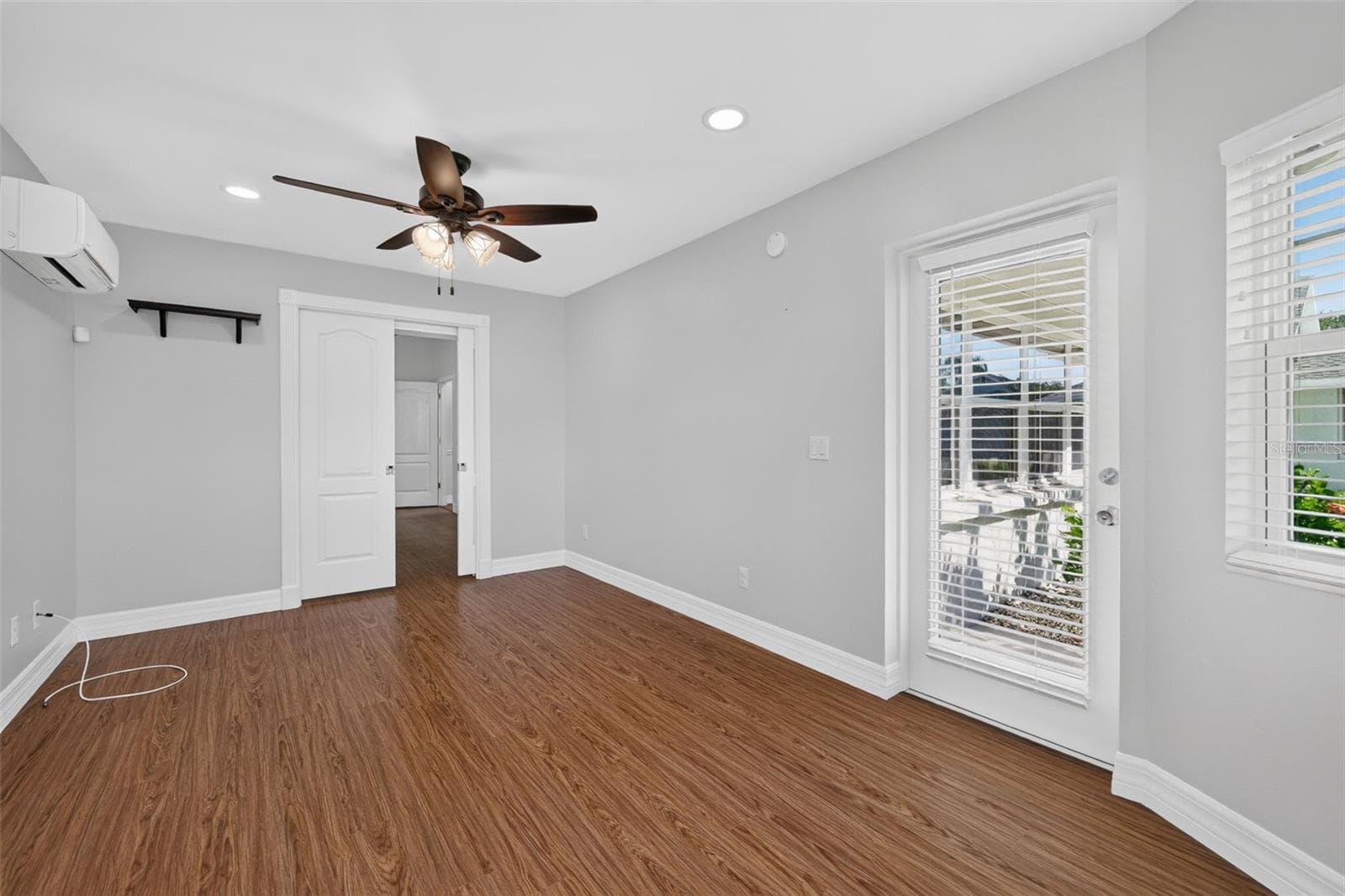 Private Office with Pocket Doors off Primary Bedroom - 4431 FERN DR, BRADENTON