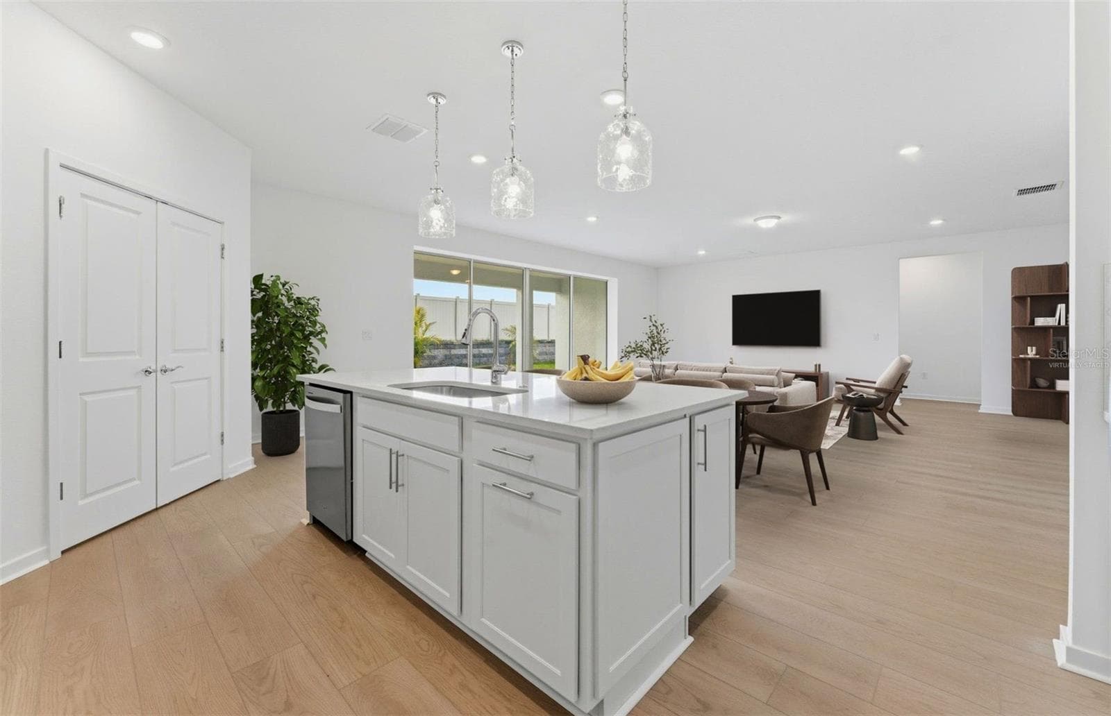 Virtually Staged - Open Kitchen to Cafe to Gathering Room - 9738 AUTUMN RIDGE AVE, RIVERVIEW