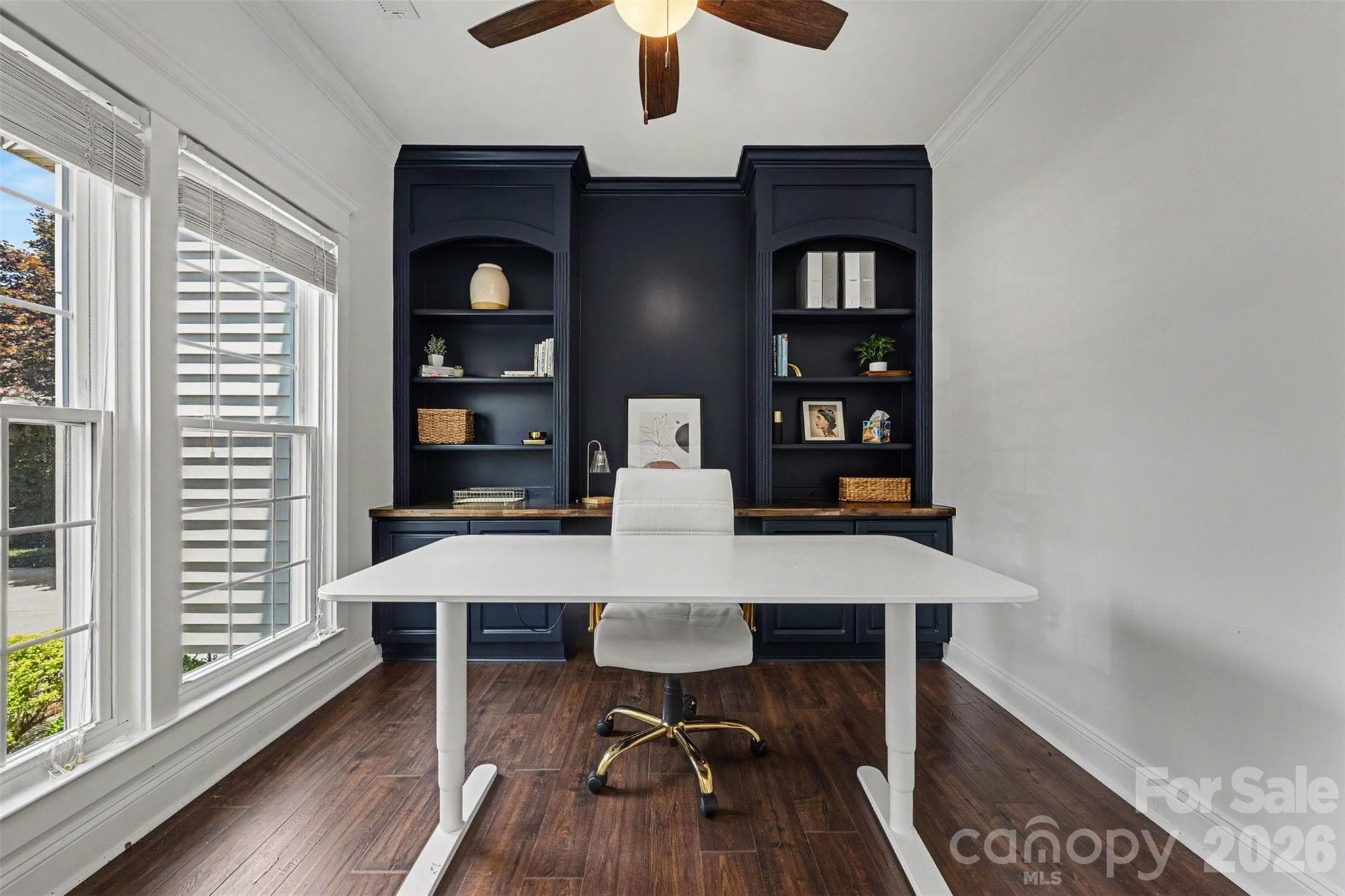 Office with custom built-ins is located to the left when you enter the front door. Lots of natural light! - 2442 Smith Cove Road, Denver