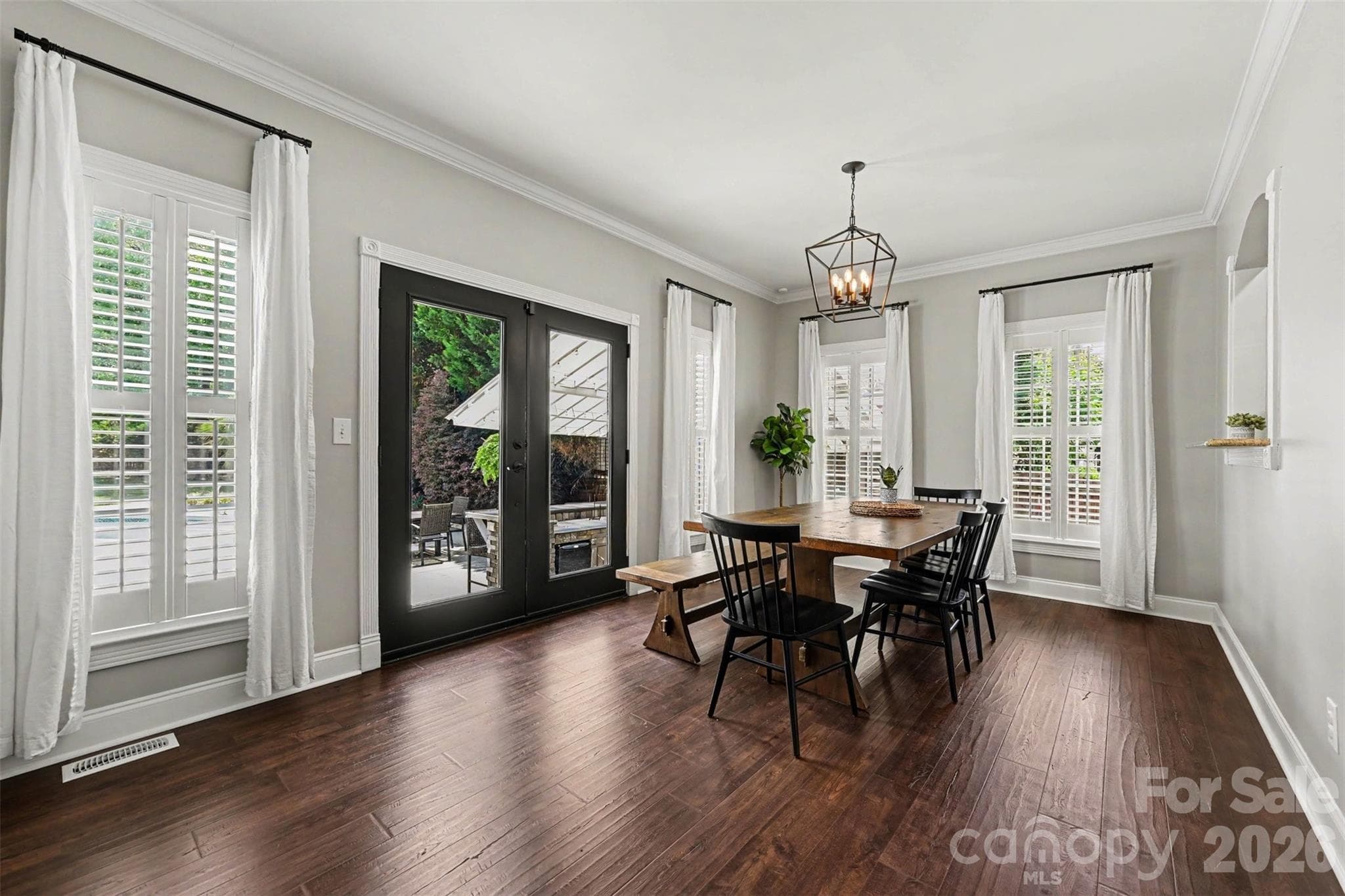 Flex space currently being used as another dining area. Opens to the outside oasis. There are multiple ways this room could be utilized. - 2442 Smith Cove Road, Denver