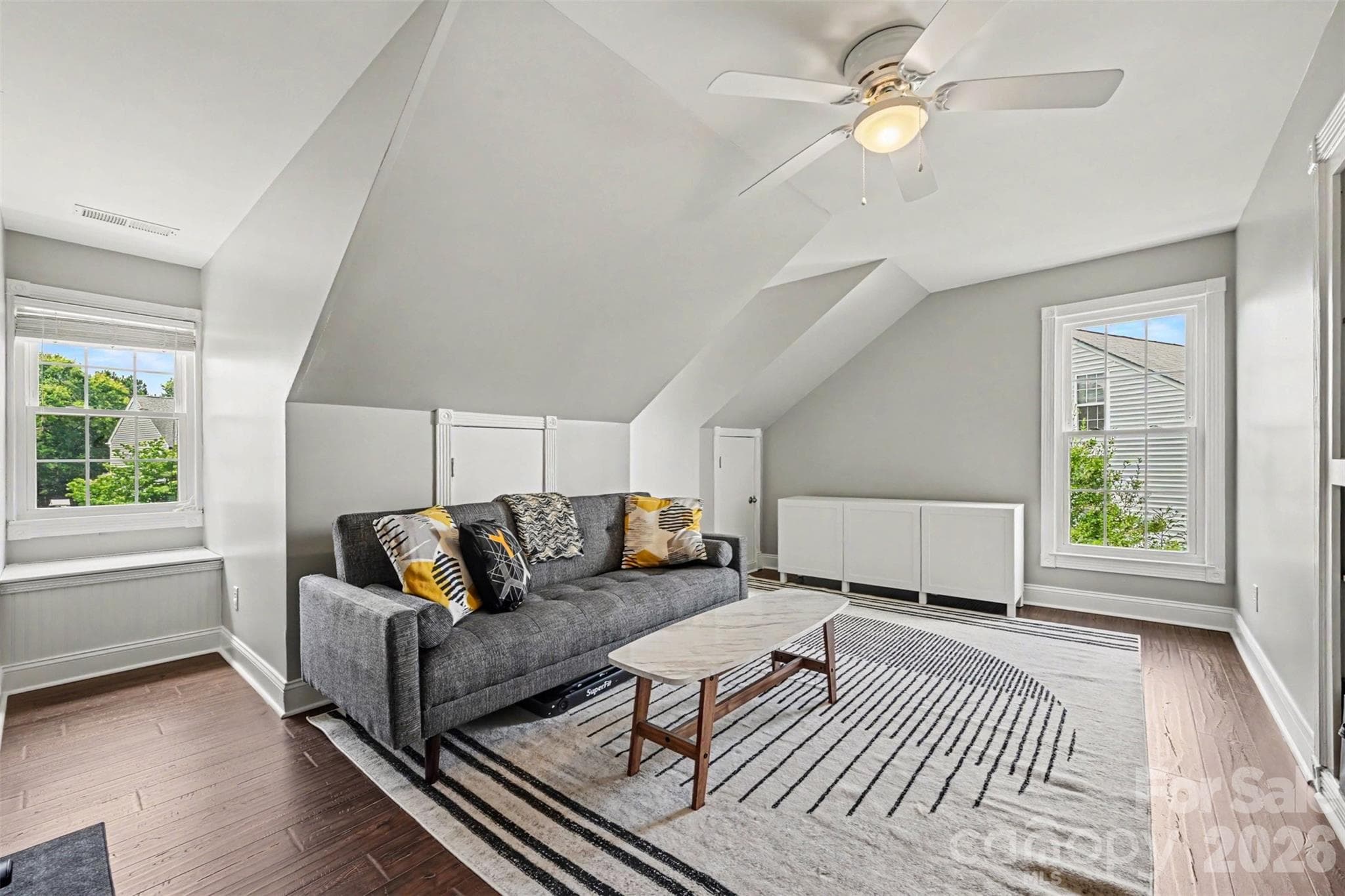 Bonus room area with dormer attic storage. - 2442 Smith Cove Road, Denver
