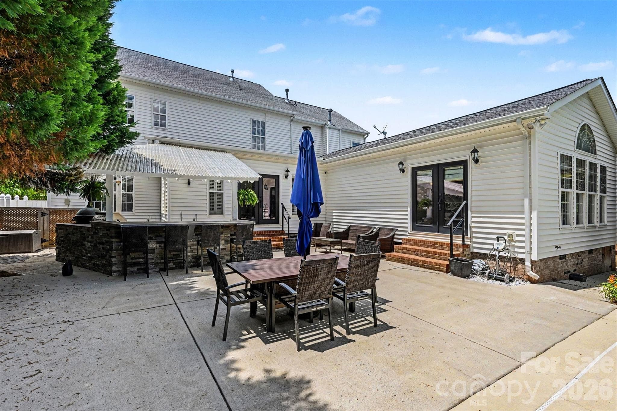 View of the outdoor kitchen area. - 2442 Smith Cove Road, Denver