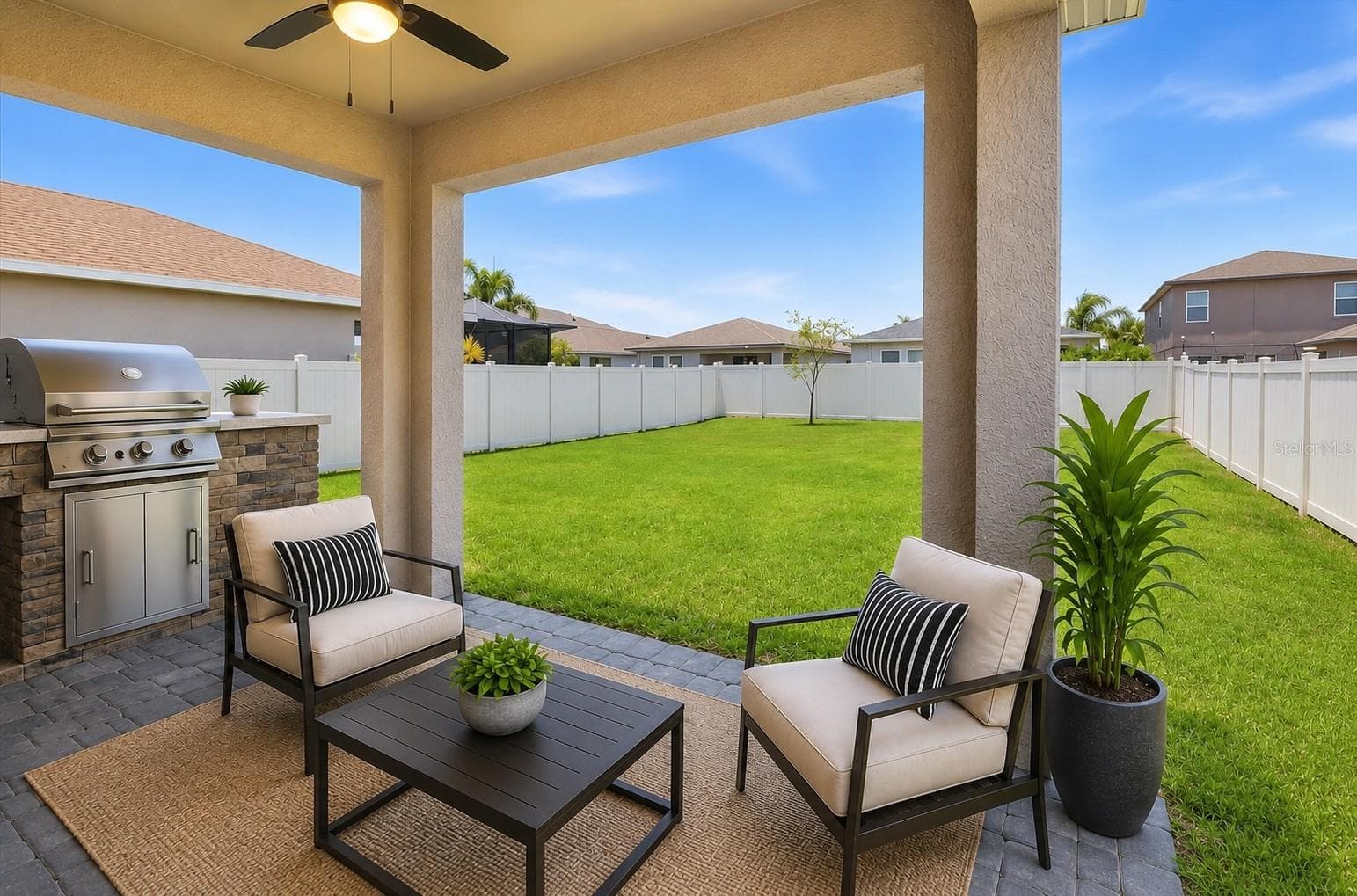 Back Covered, Pavered Patio w/ fan - 5718 LOS ROBLES CT, PALMETTO