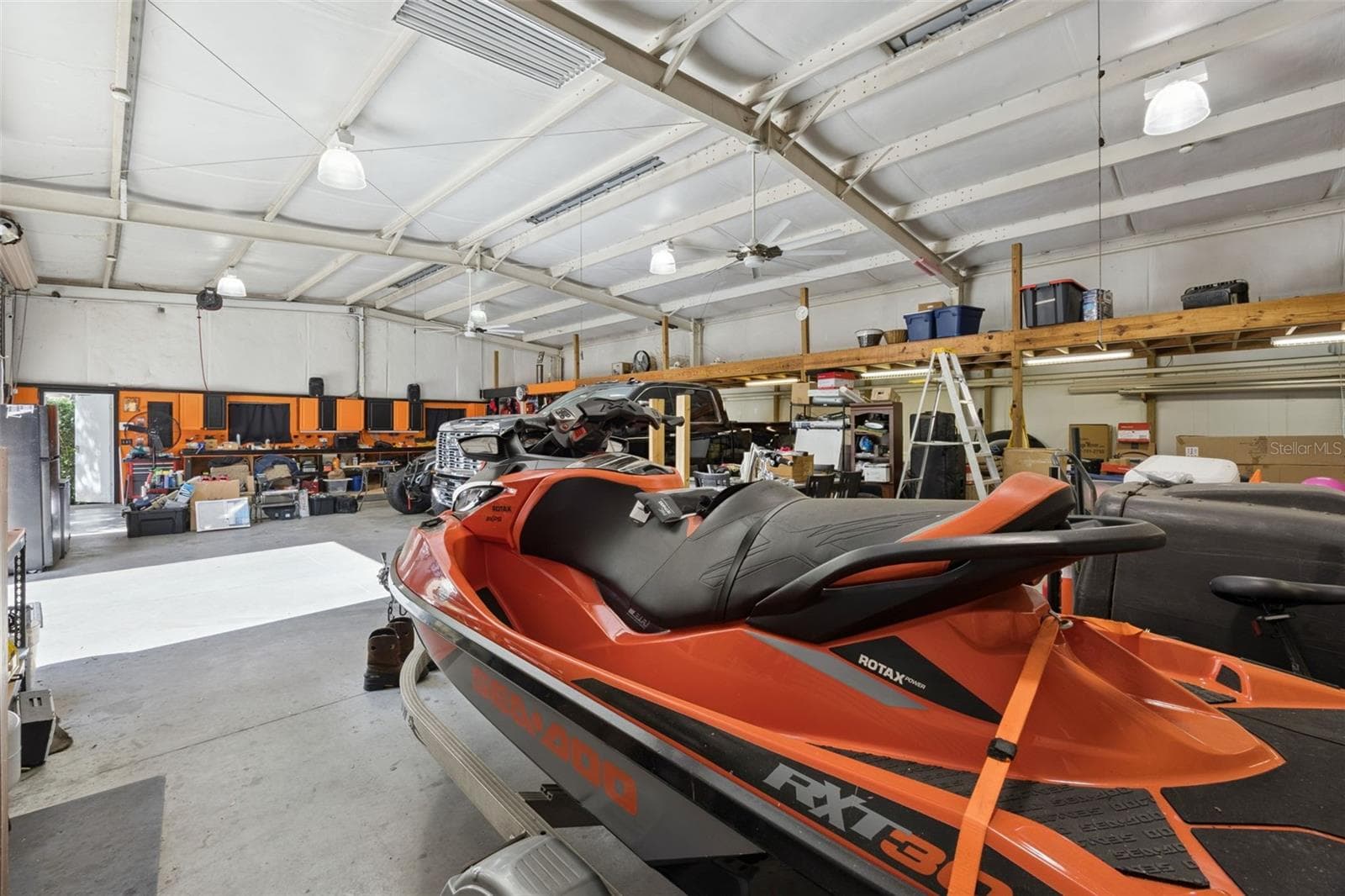 Detached garage with extensive storage, workshop areas - 605 OLD MOUNT DORA RD, EUSTIS