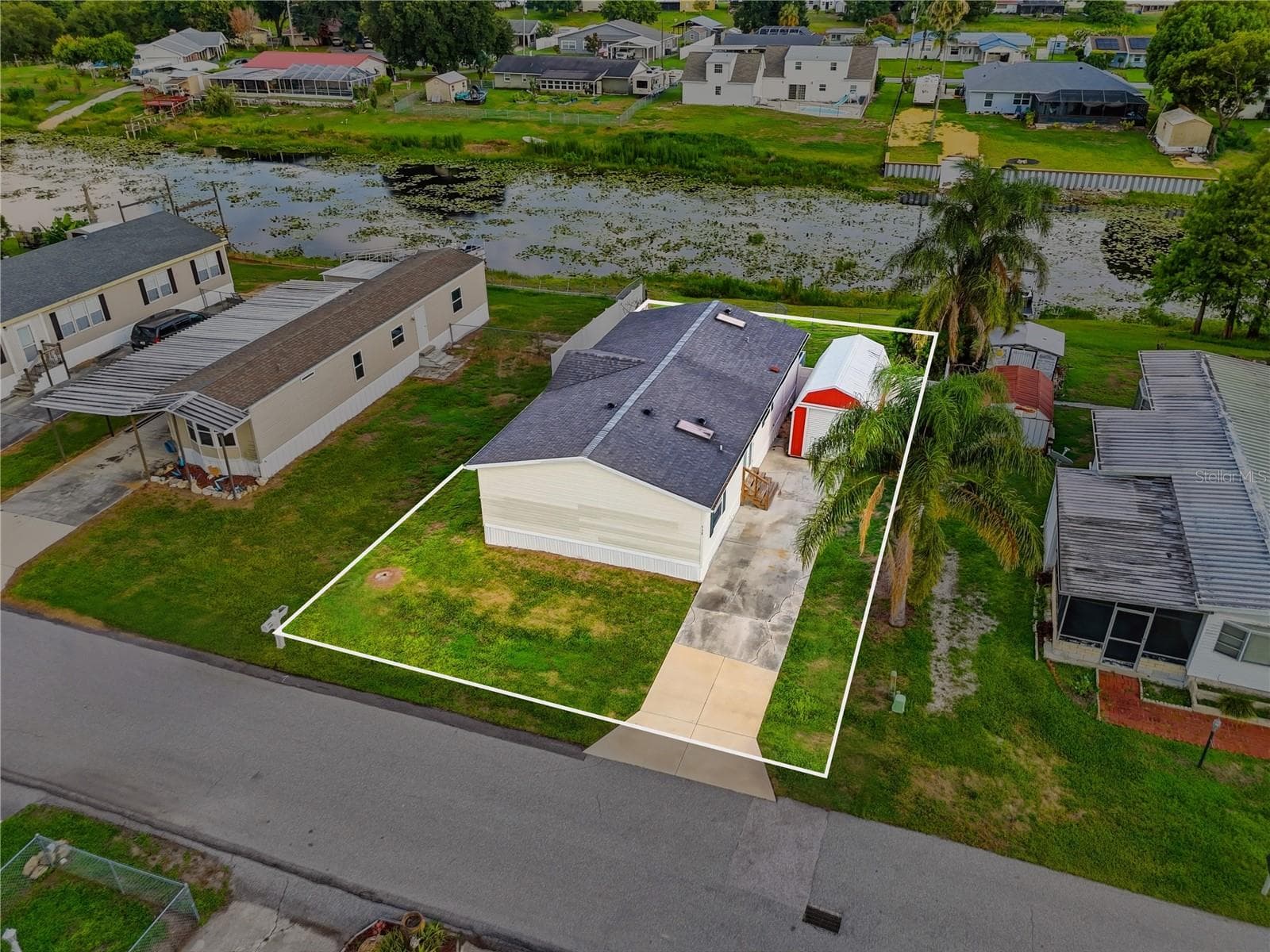 Manufactured Home at 338 1ST AVE N, LAKE WALES, photo 7 of 60