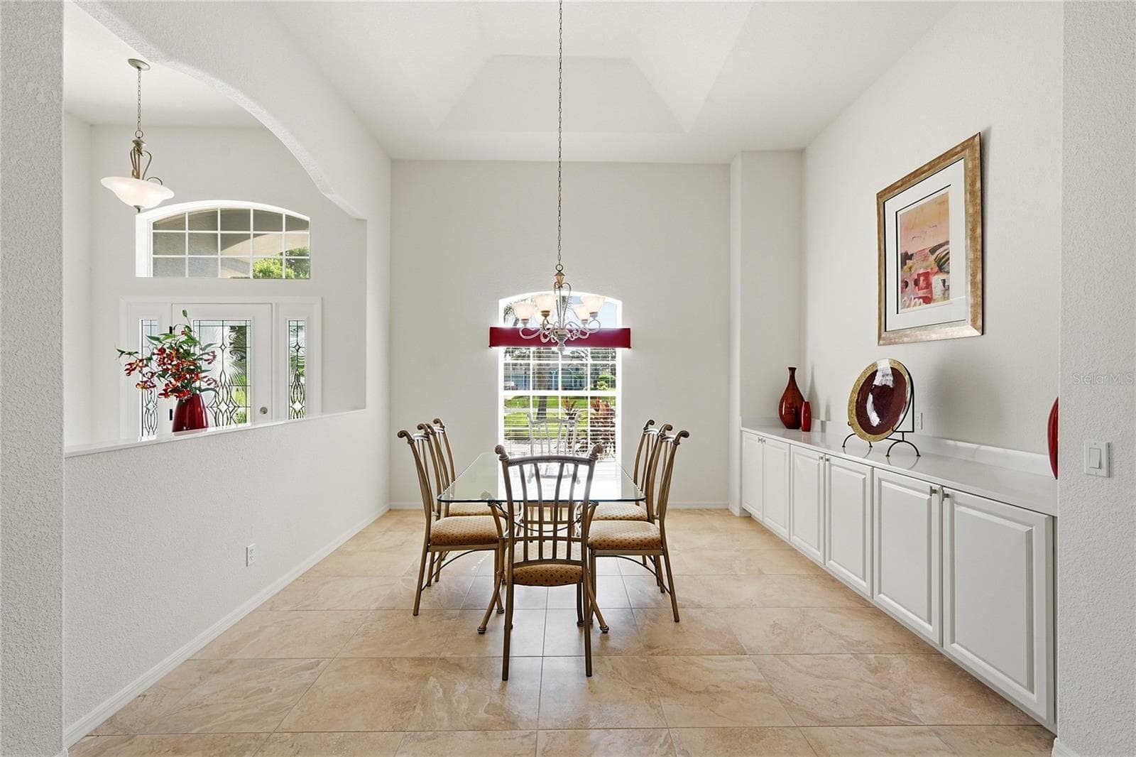 Dining Room and Open to entire Floor Plan - 816 BOUNDARY BLVD, ROTONDA WEST