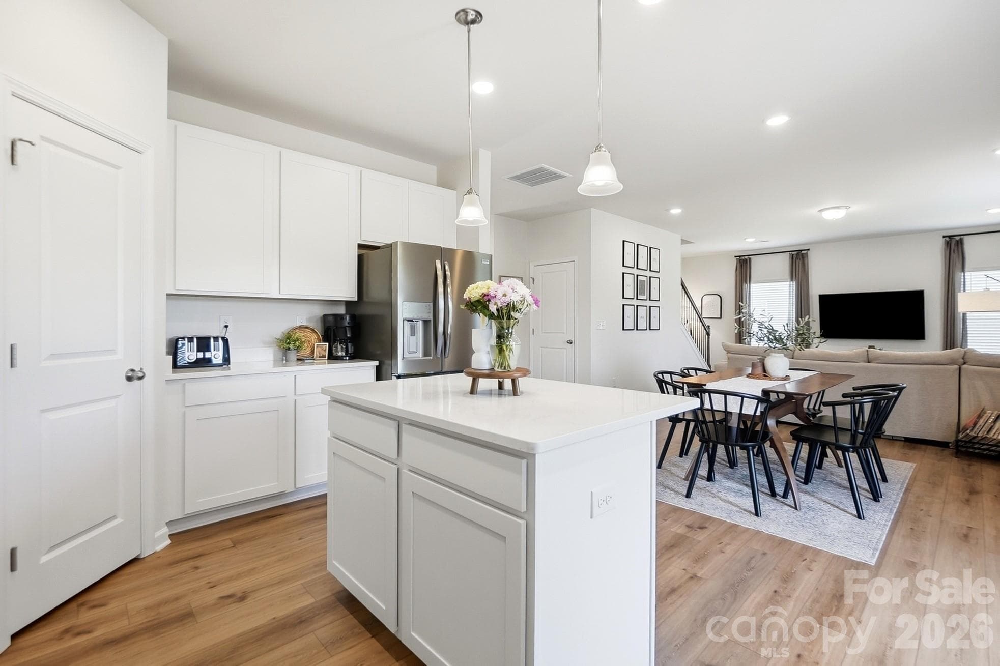 Center island creates the perfect gathering place in the kitchen. - 6023 Busch Way, Midland