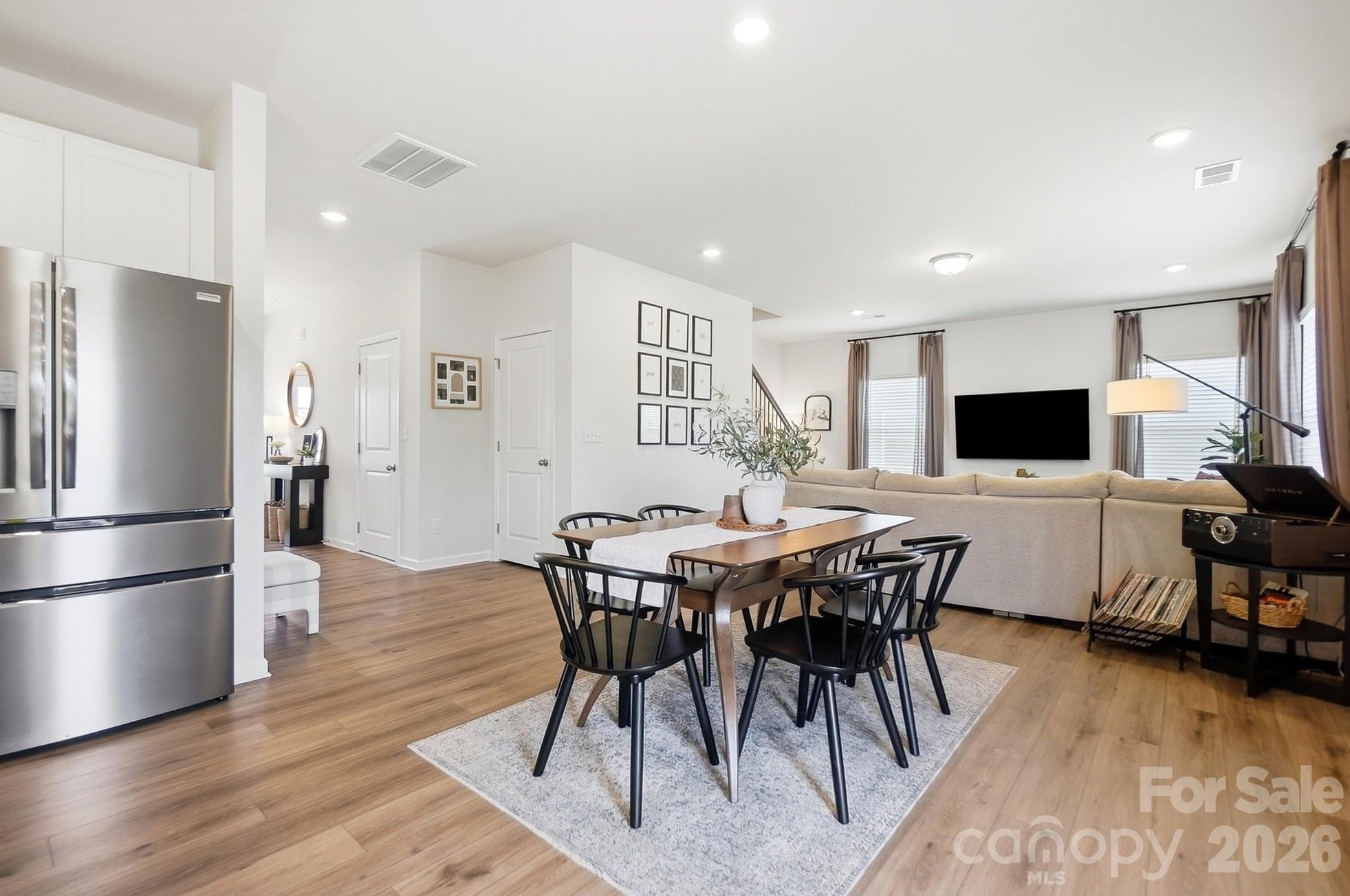 Open kitchen and dining area make entertaining easy. - 6023 Busch Way, Midland