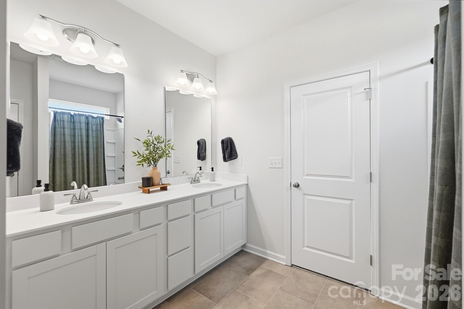 Spacious primary bathroom with excellent counter and storage space. - 6023 Busch Way, Midland